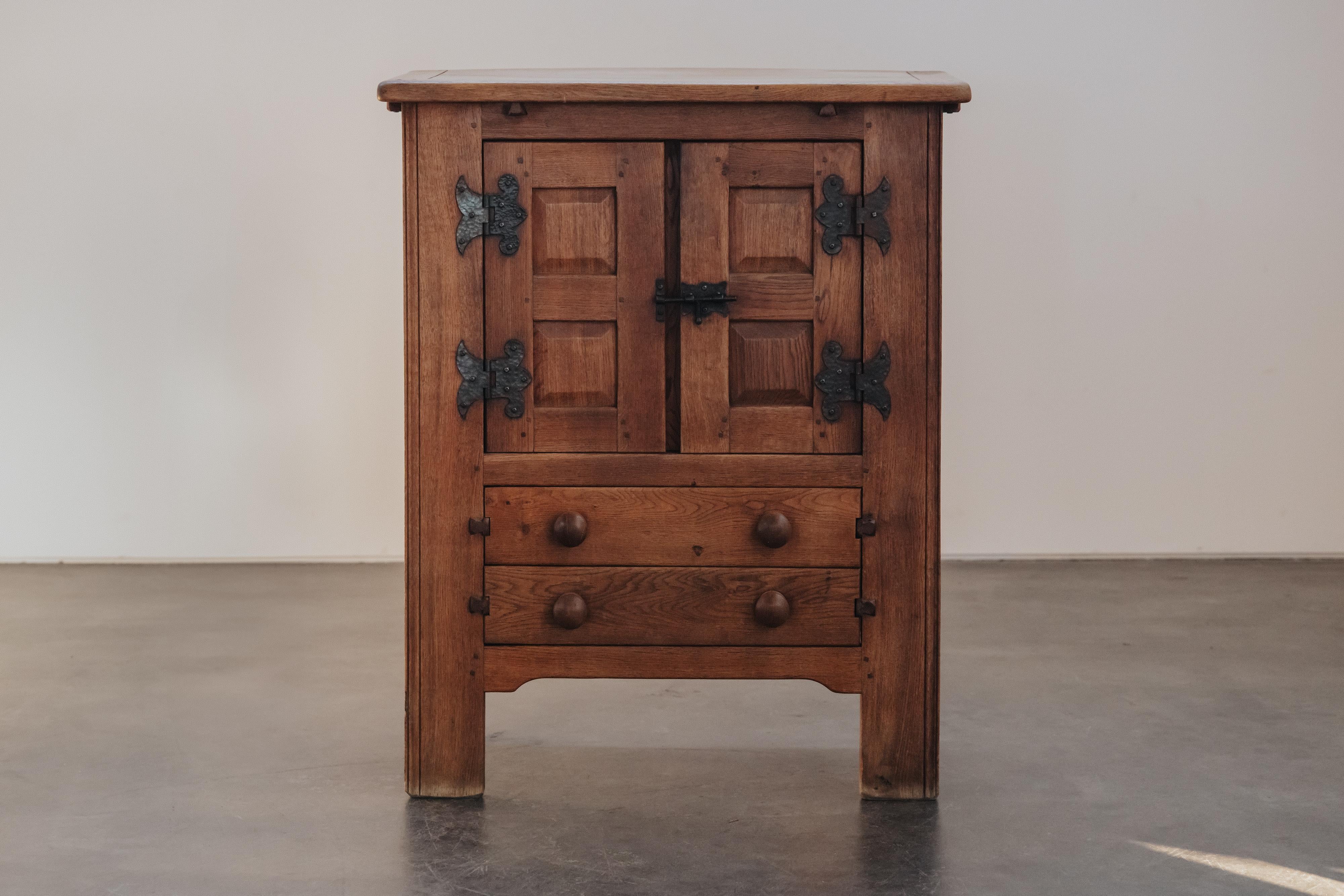 Mid Century Oak Cabinet From France, Circa 1960.  Solid oak construction with original hardware.  Excellent condition.
