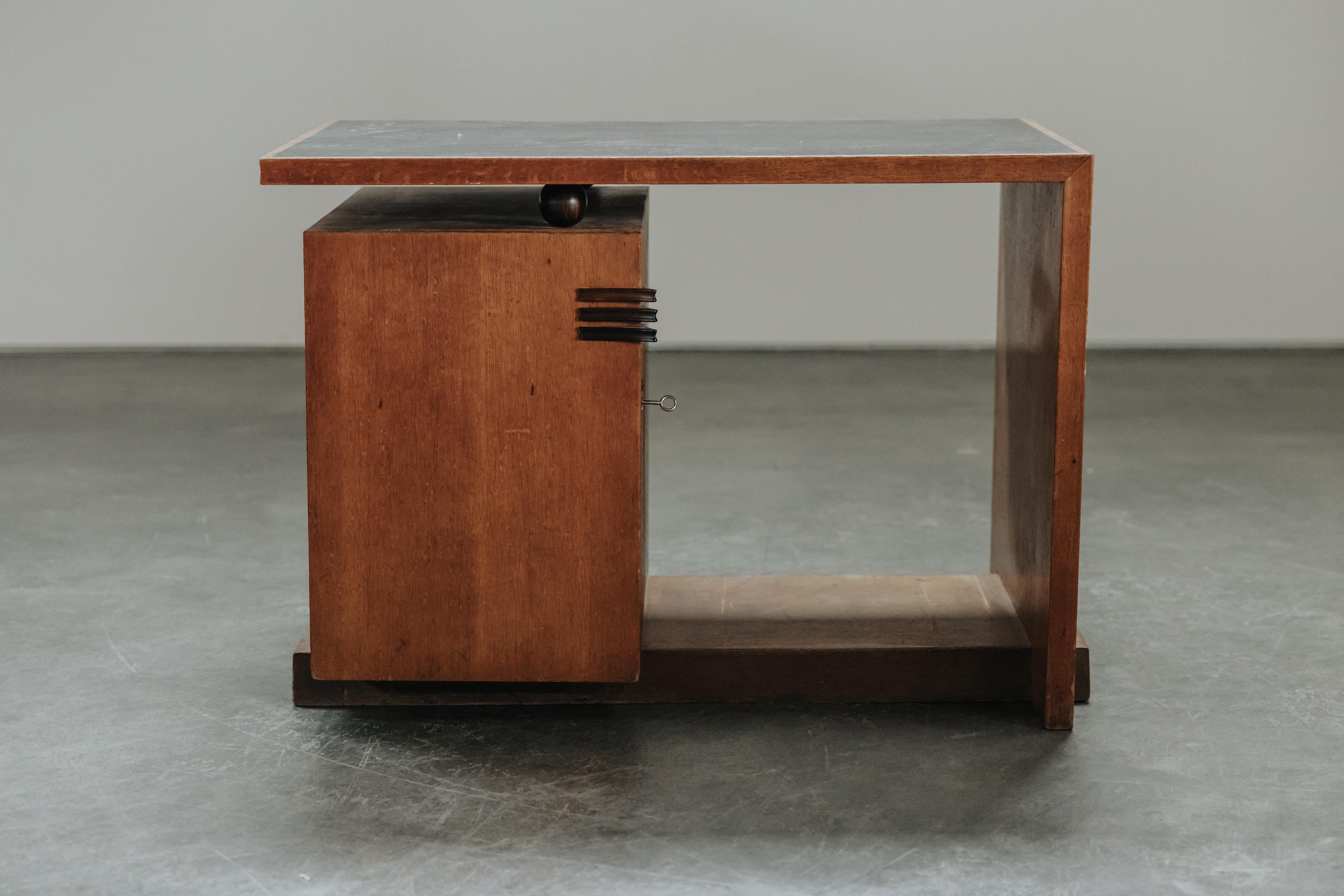 Mid Century Oak Desk From The Netherlands, Circa 1950.  Rare model with original hardware.  Great patina and use.