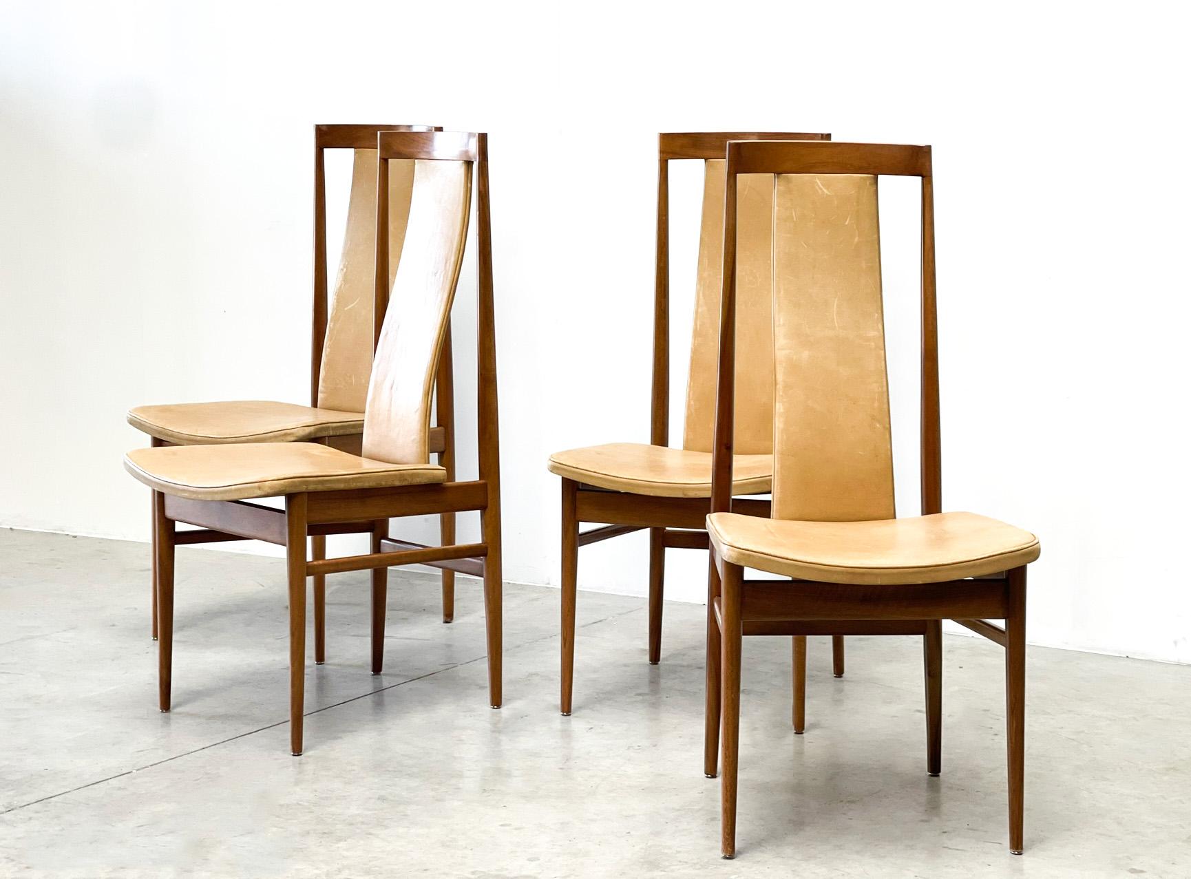Gorgeous mid century dining chairs with a scandinavian inspired design.

Finely crafted frames with leather seats. 

Good condition with some nice patina. 

1960s - France

Dimensions:

Chairs:
Height: 107cm/42.12
