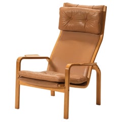 Sedia da salotto di metà secolo in Oak e pelle di Yngve Ekström per Swedese, anni '60