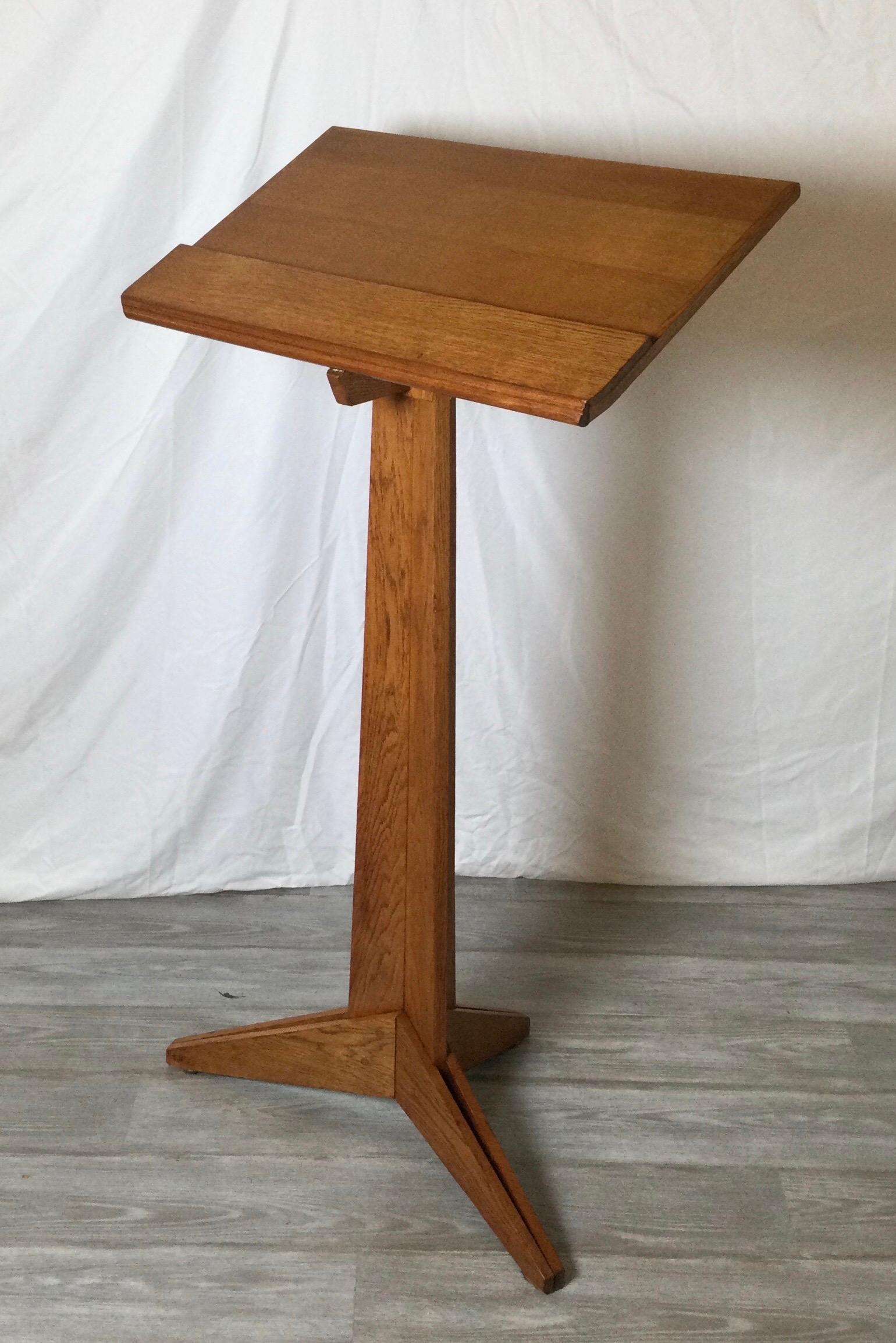 Tall solid oak standing lectern or wood podium. Handsome in. a geometric Frank Lloyd wright style. Finely hand crafted using wood dowel construction. Measures: 25