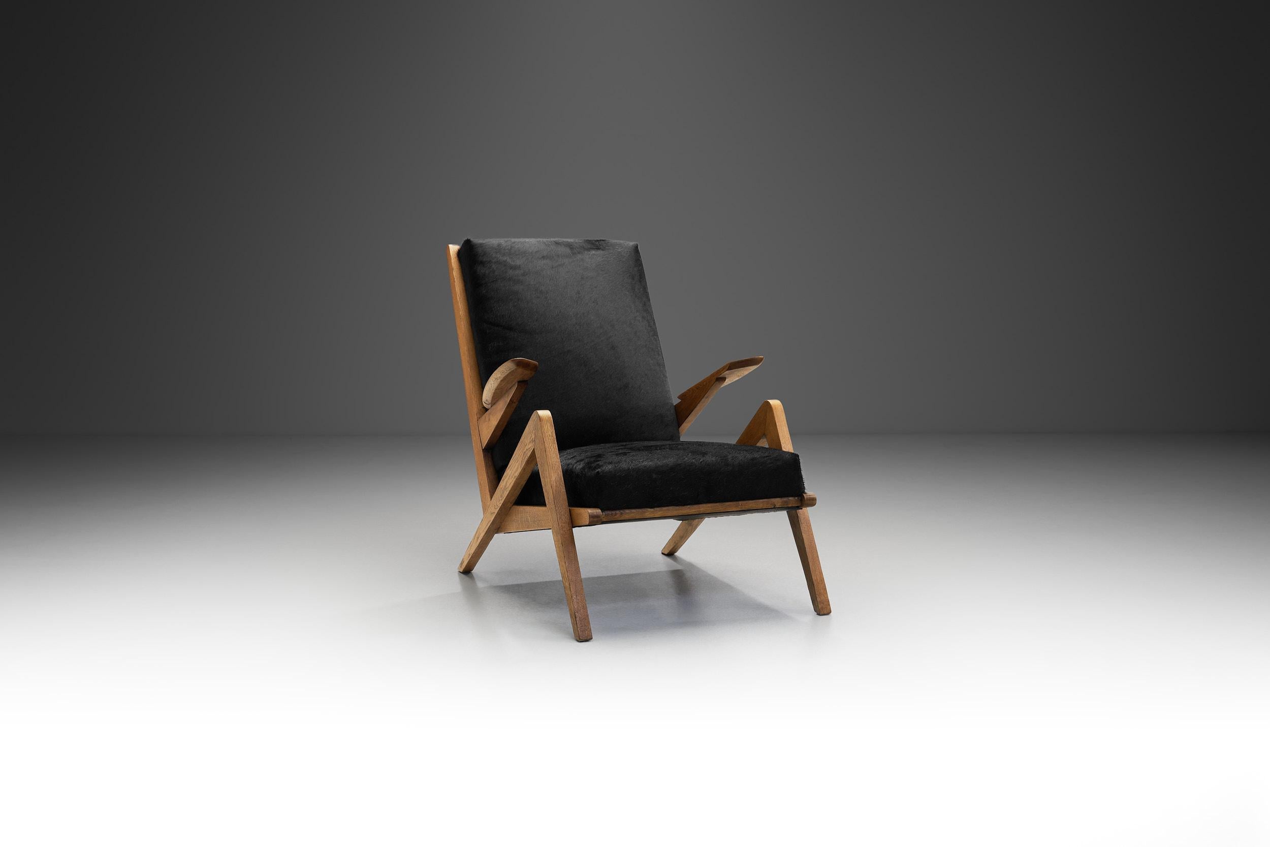 French Mid-Century Oak Lounge Chair for Souplina, France circa 1950s