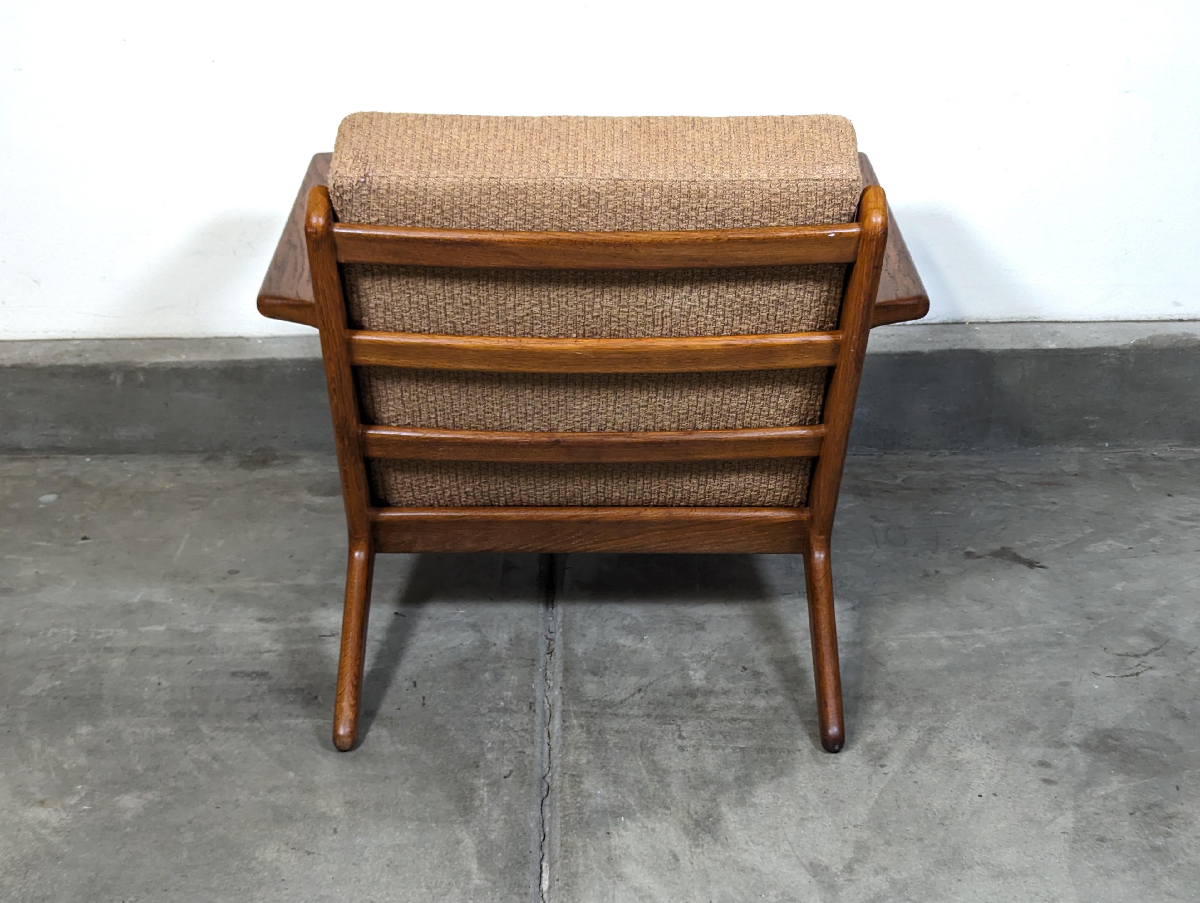 Danish Mid Century Oak Lounge Chair by Hans Wegner for GETAMA GE-290, Denmark, 1960s For Sale