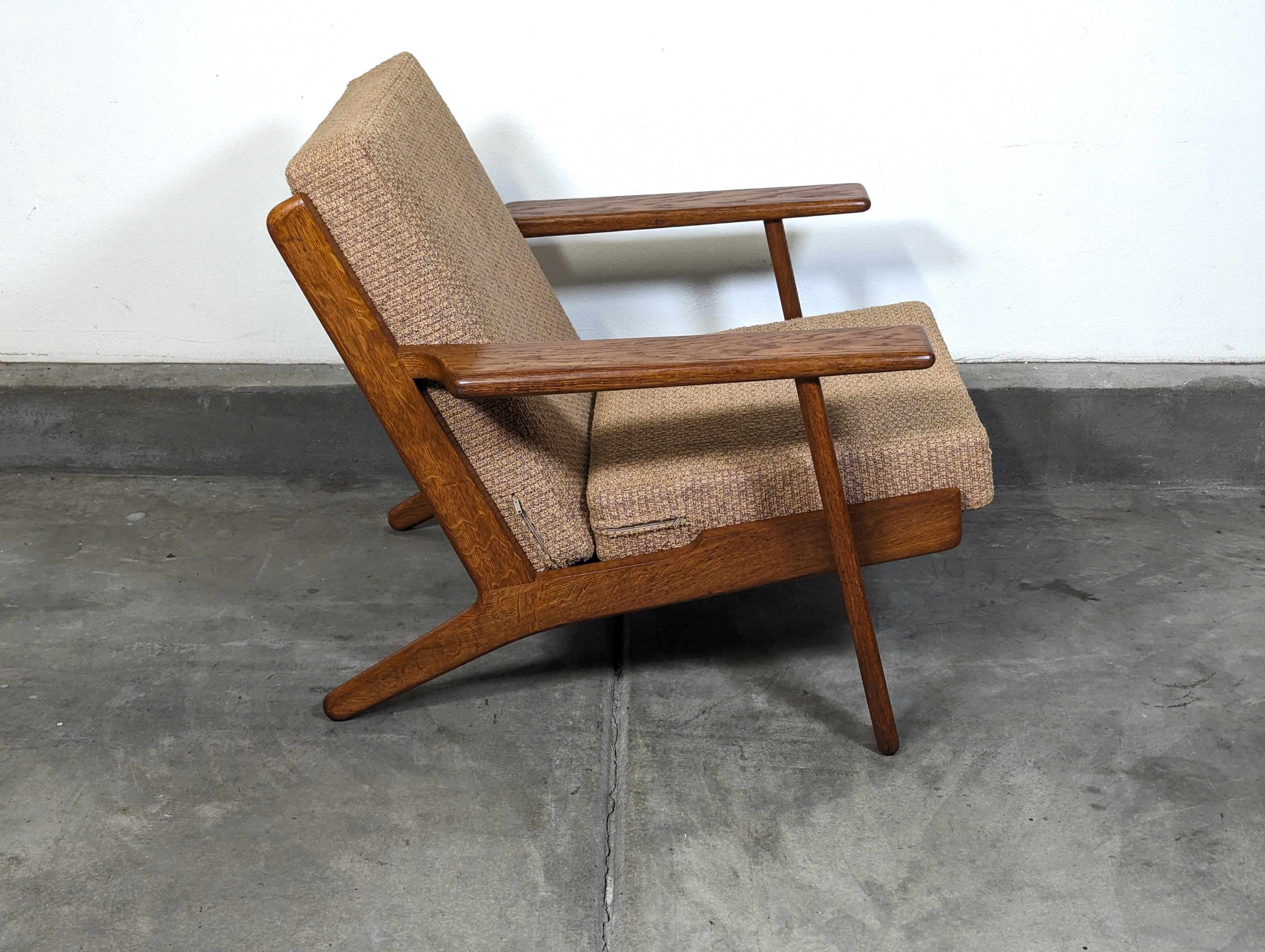 Mid-20th Century Mid Century Oak Lounge Chair by Hans Wegner for GETAMA GE-290, Denmark, 1960s For Sale