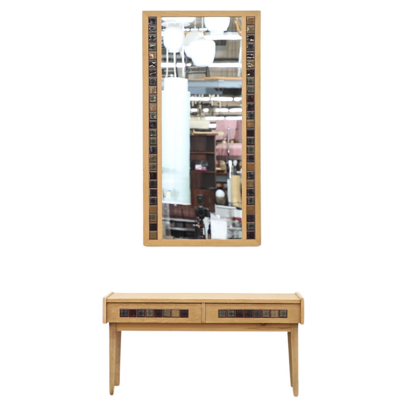 Danish Mid-Century oak and ceramic tile wall mount mirror designed by Erik Kjerkegaard. In original condition with normal wear for its age and use.  Shown with matching little cabinet (LU922431700672) listed separately.