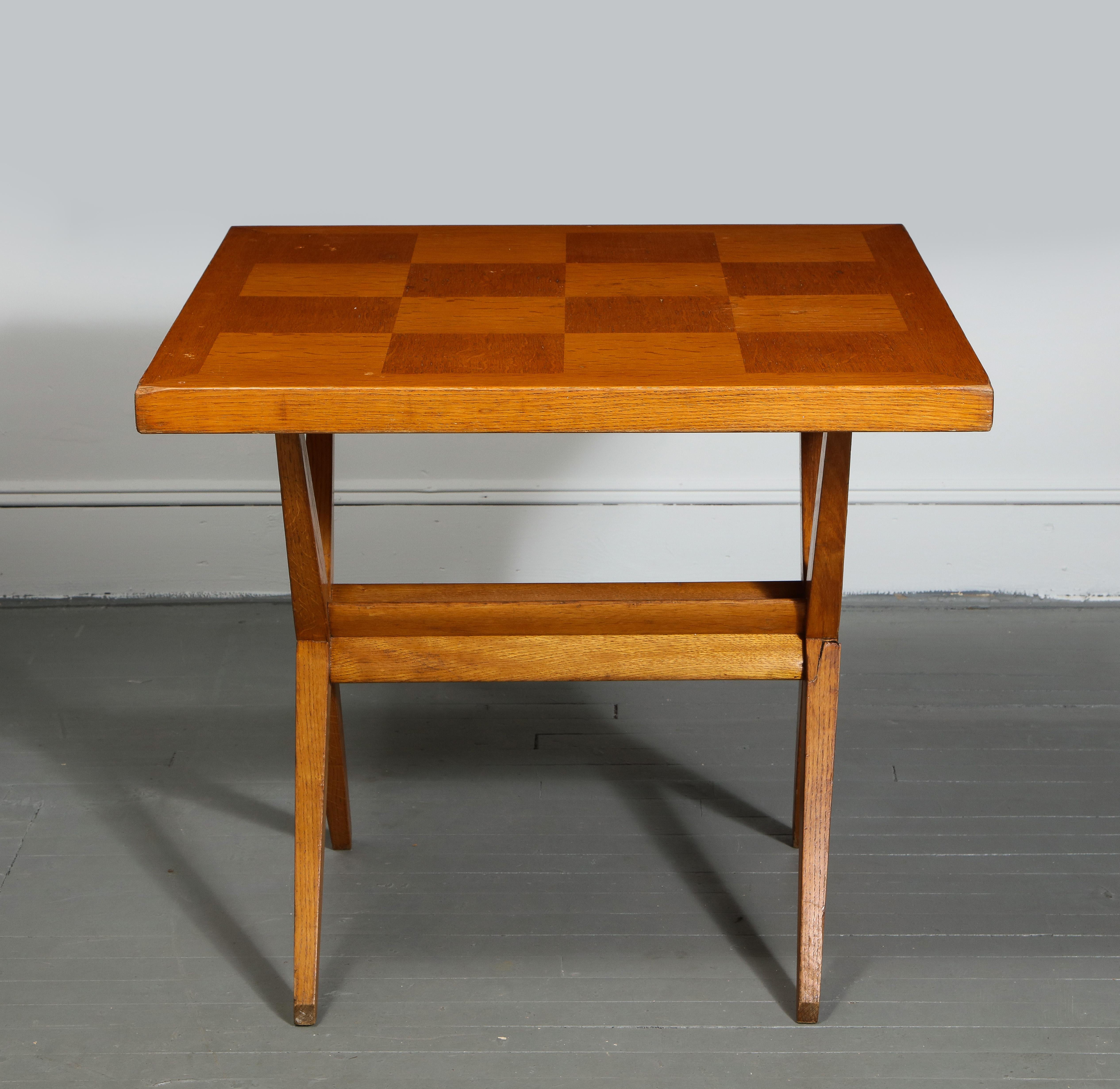 Mid-Century Oak Table with Parquetry in the Manner of Pierre Jeanneret, c. 1950s. 

Handsome design consists of clean X-shaped legs, adjustable base, and a removable square table top with stunning parquetry.