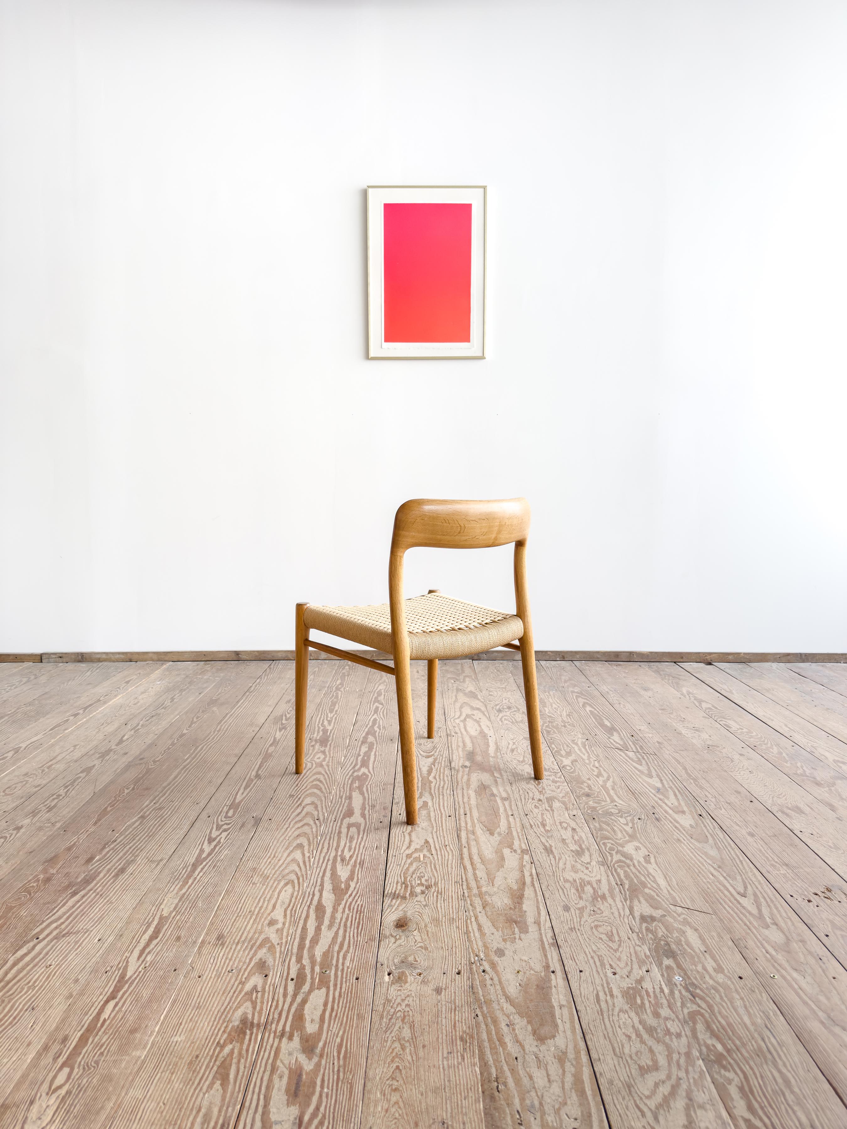 Original dining chair by Niels O. Møller, produced by J.L. Møllers Møbelfabrik in Denmark. Designed in 1954, Model 75 is a compact, elegant side chair with a gently curved backrest, refined proportions, and hallmark Scandinavian lightness – a
