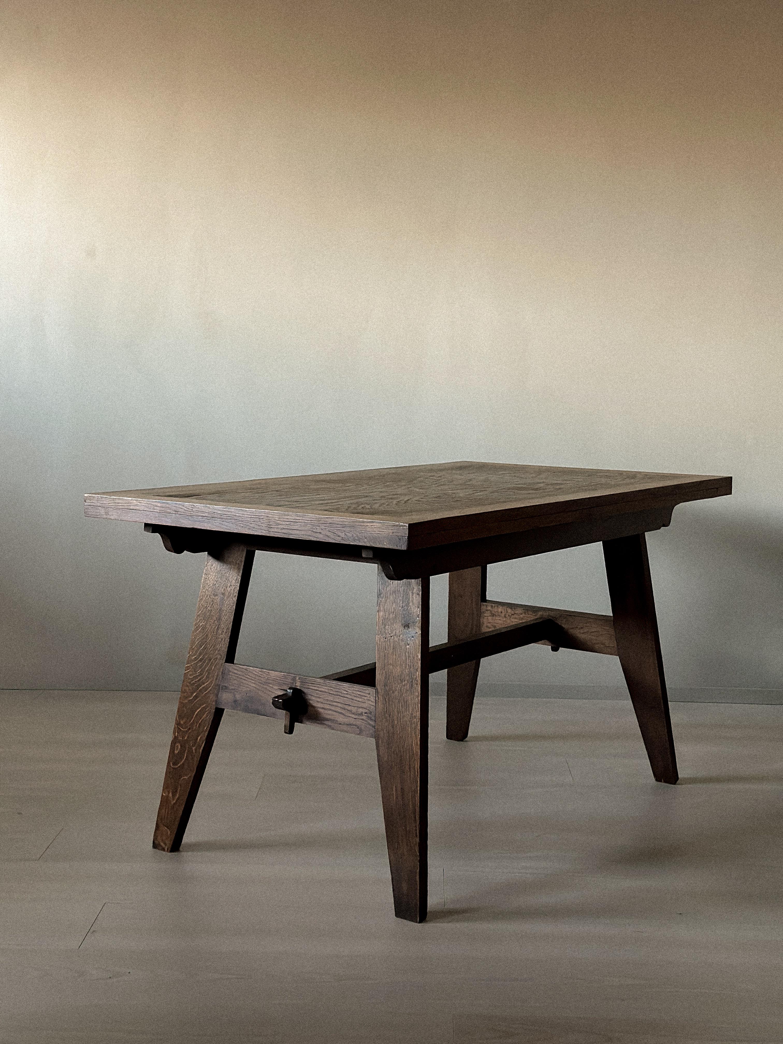 A beautiful table in oak designed by René Gabriel, France 1945.

René Gabriel put himself at the service of French Reconstruction from the 1940s. He designed furniture intended to be produced in large series, using local wood species such as oak,