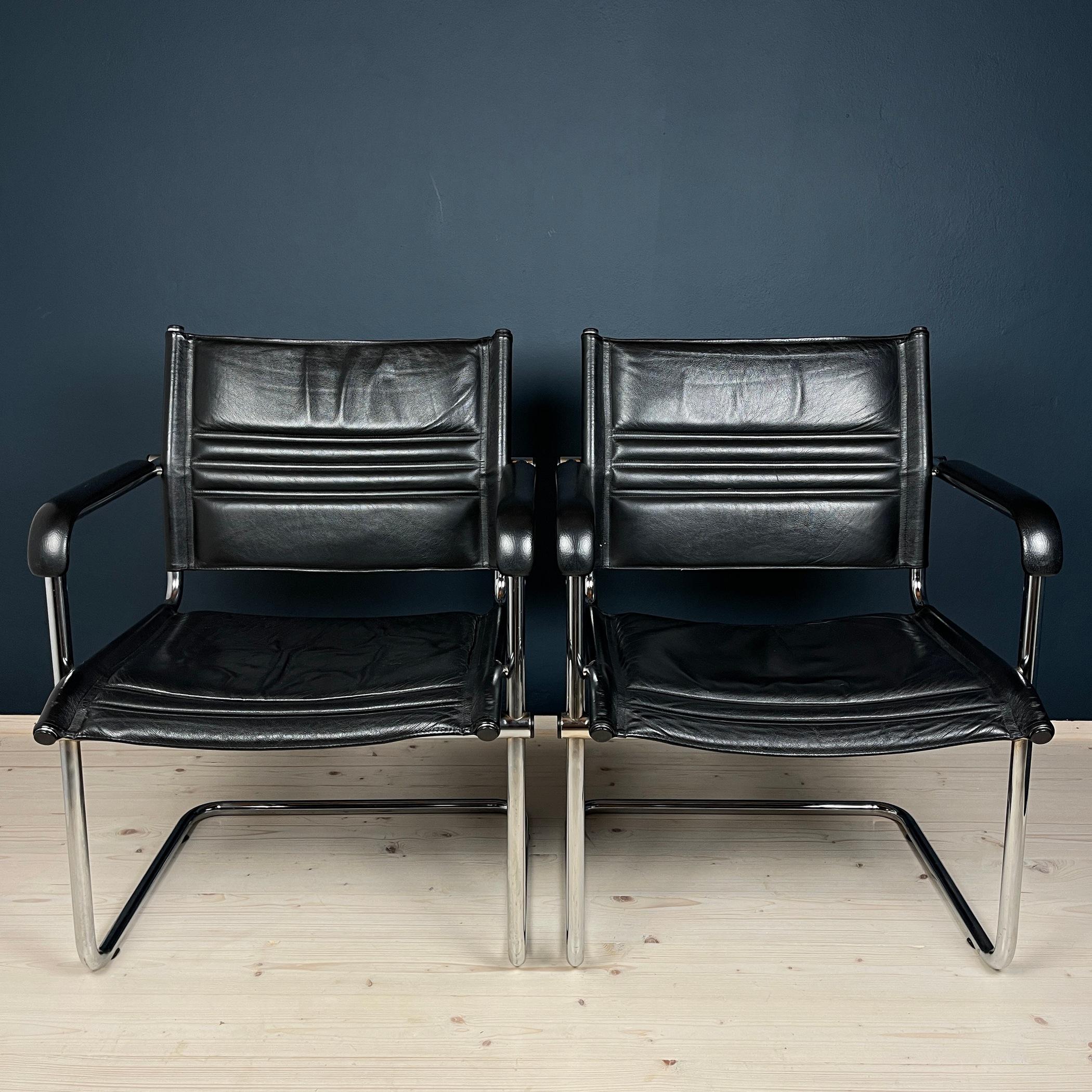 A pair of beautiful office chairs by Stol Kamnik were made in the mid-80s in Yugoslavia (designed by Mart Stam). Mart Stam is a famous Dutch architect and designer who worked in the Bauhaus style. He developed several models of cantilever chairs,