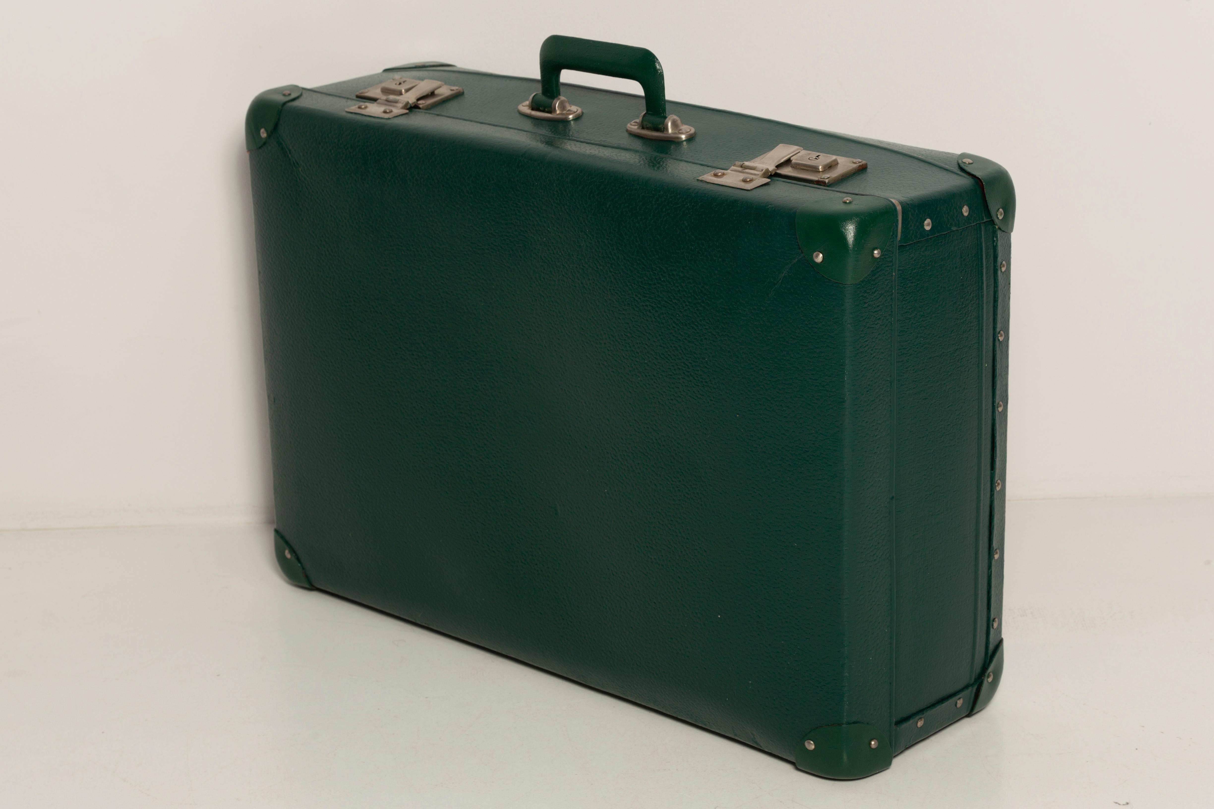 green vintage suitcase
