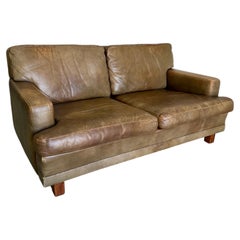 Mid Century Olive Buffalo Leather and Rosewood Loveseat after Arne Norell