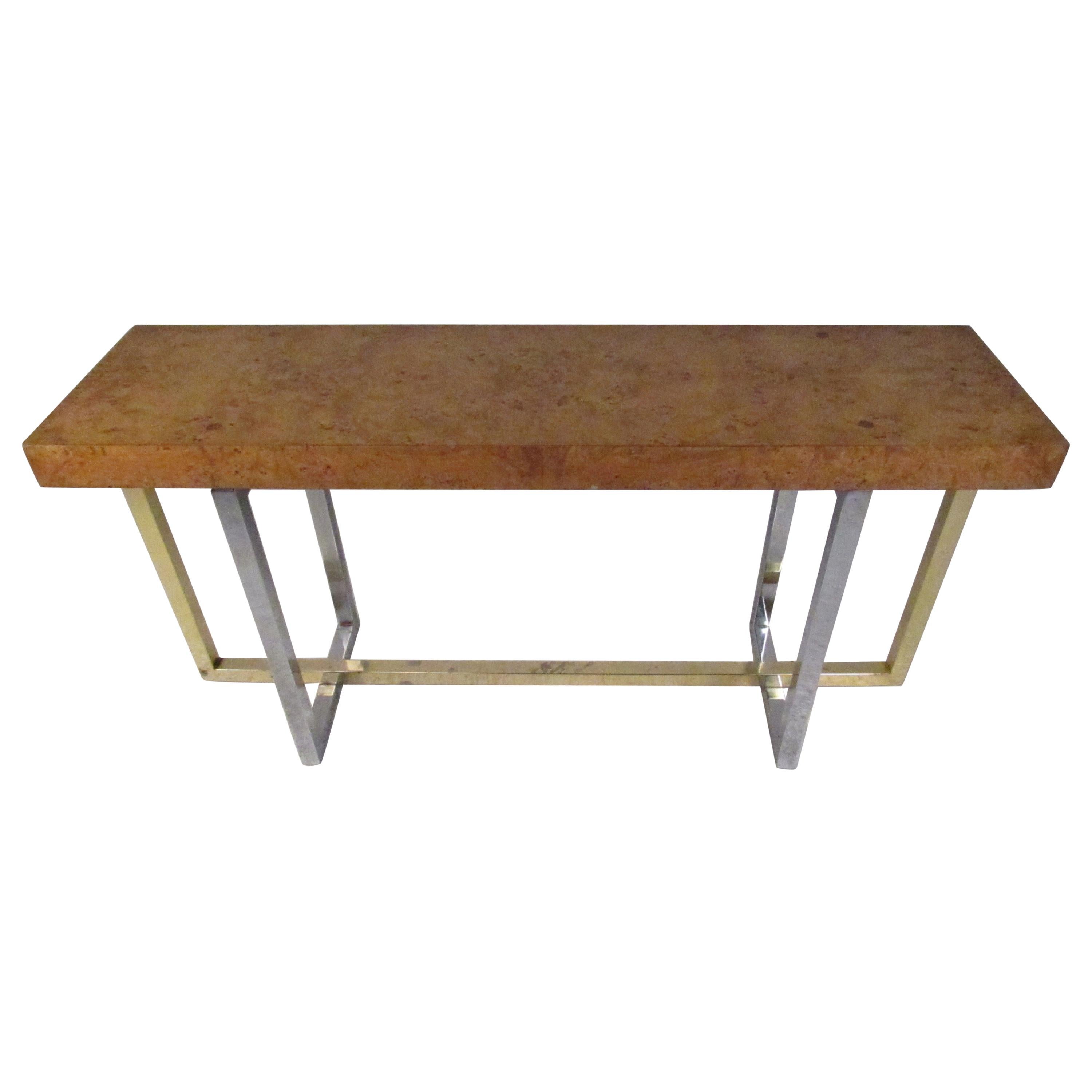 This elegant vintage modern hall table boasts a two-tone 