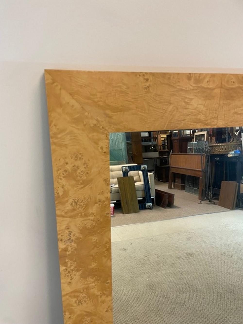 Mid Century Modern olive wood modern framed mirror. Original finish in excellent condition. Dimensions: 2