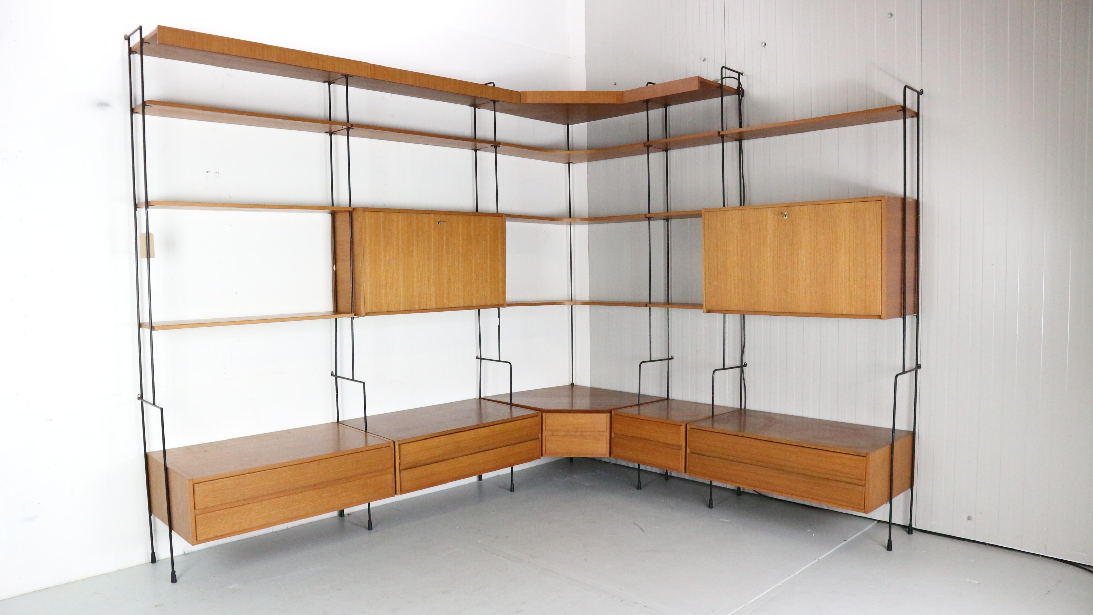 Mid- Century modern period modular corner wall unit designed by Ernst Dieter Hilker and manufactured by 
