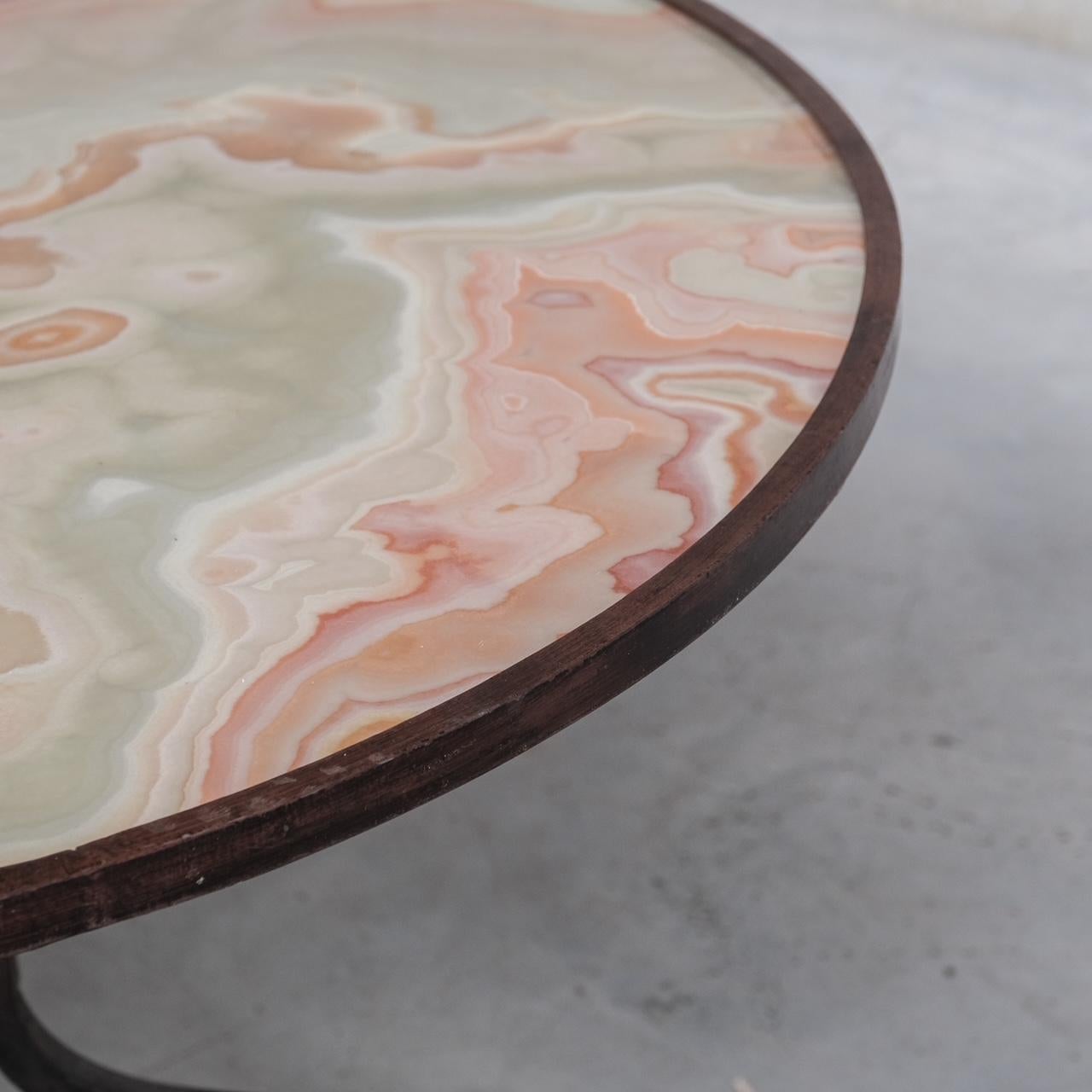 An onyx and iron dining table. 

Italy, c1960s.

Large thick onyx slab, good colouring and veining, on iron base.

Location: Belgium Gallery. 

Dimensions: 132 Diameter x 75 Height in cm. 

Delivery: POA

We can ship around the world.