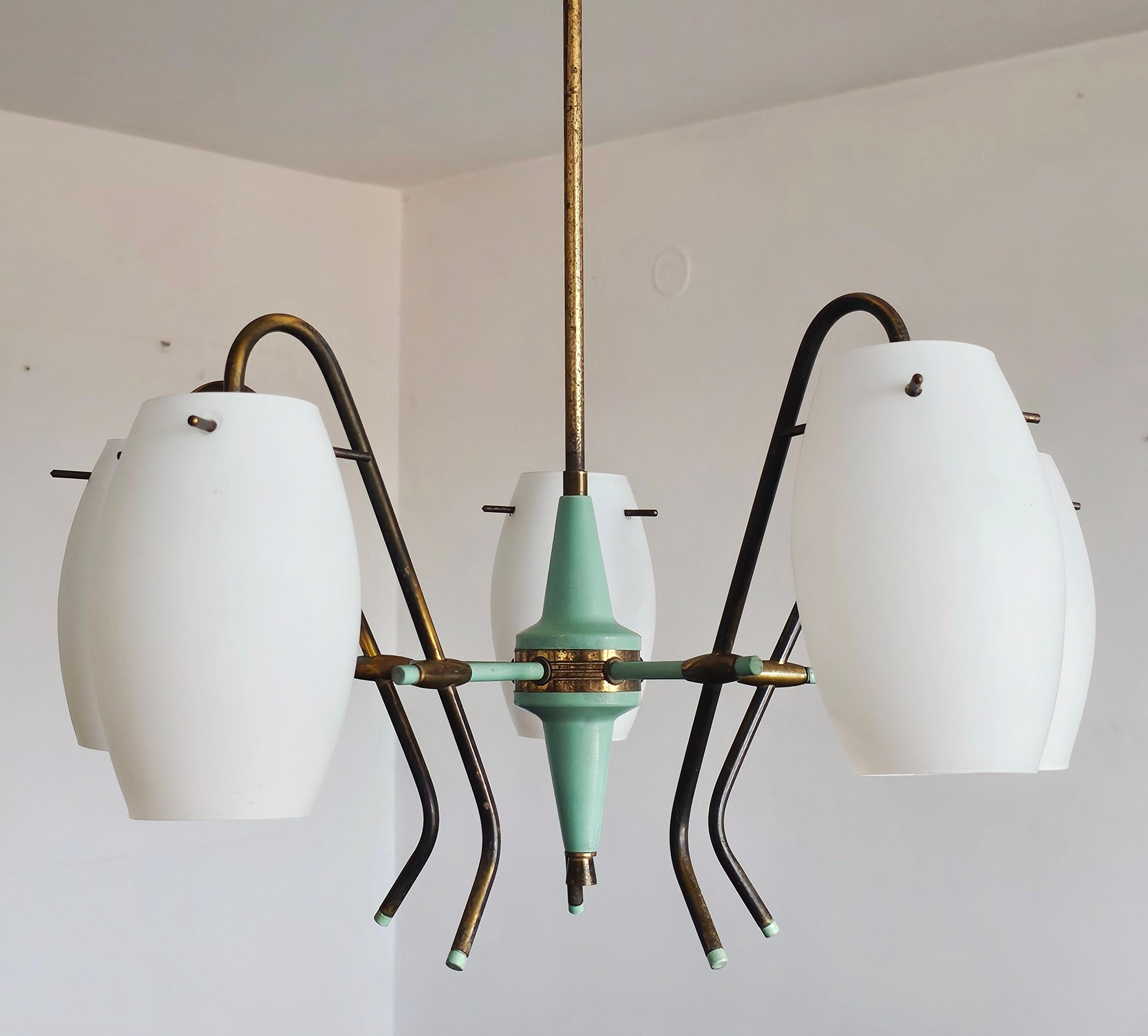 In this listing you will find a very rare 5-arm Mid Century Modern chandelier manufactured by Stilux Milano, the main competitor of Stilnovo throughout 1950s and 1960s. Chandelier features a fixture in turquoise/green and brass, while the shades are