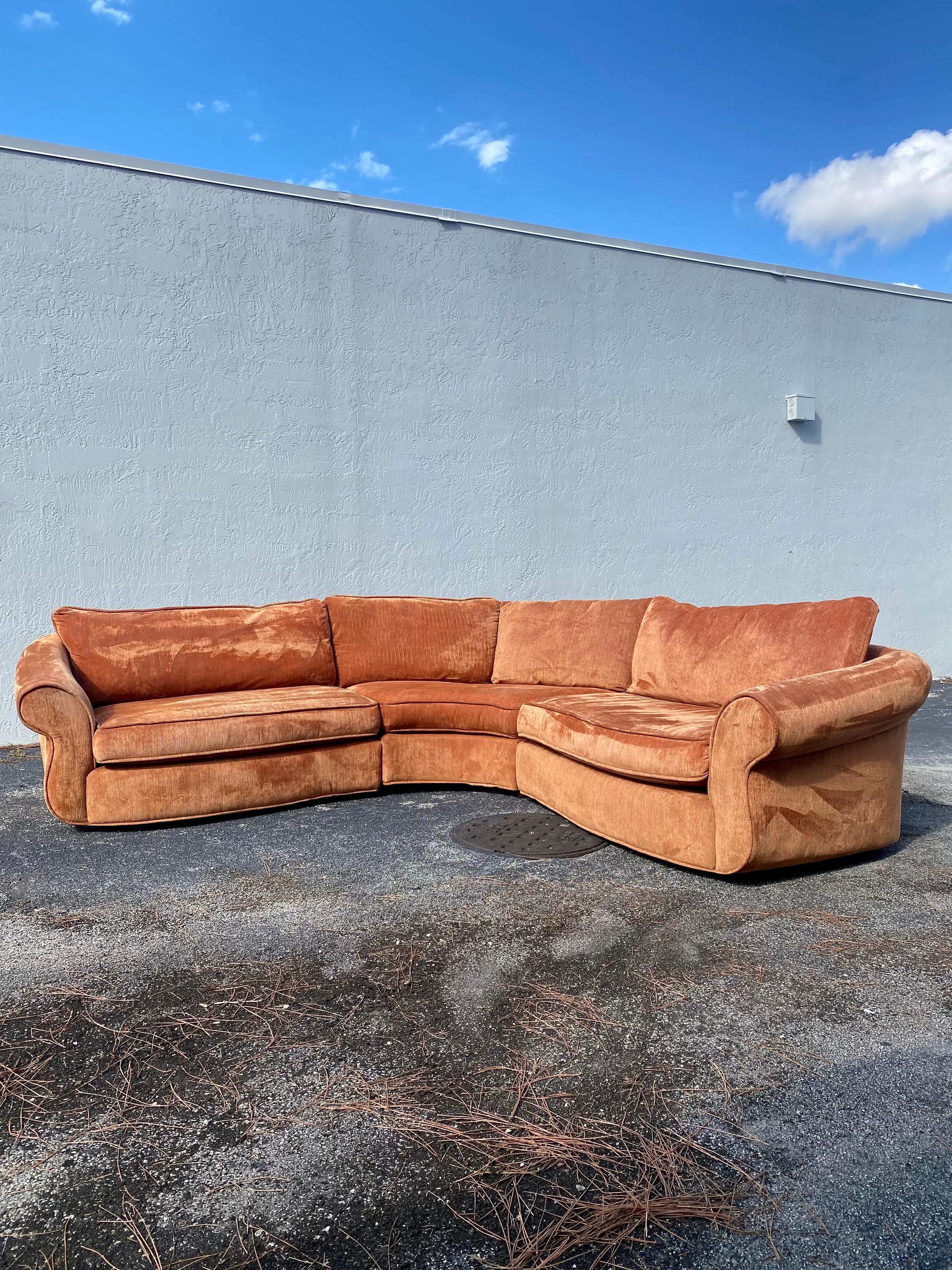 This rare sculturall sectional is statement piece which is also extremely comfortable and packed with personality! Just look at the curves and lines on this beauty! Stunning plush overstuffed cushioning and an exceptionally deep seat lend inviting
