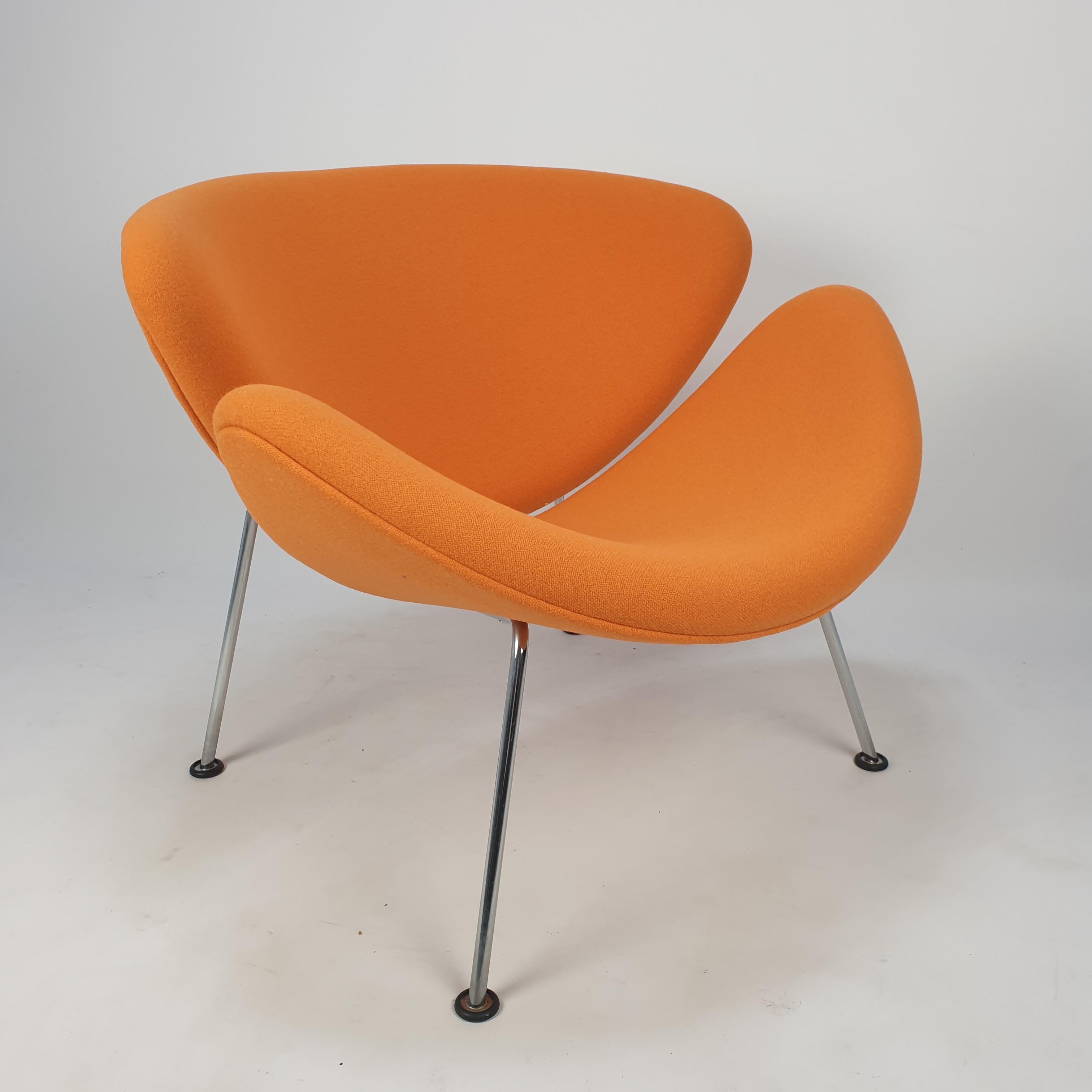 The famous Artifort orange slice chair by Pierre Paulin. Designed in the 60's and produced in the 80's. Cute and very comfortable chair. It has chrome metal legs. The structure is in very good condition. The chair has new foam and has just been