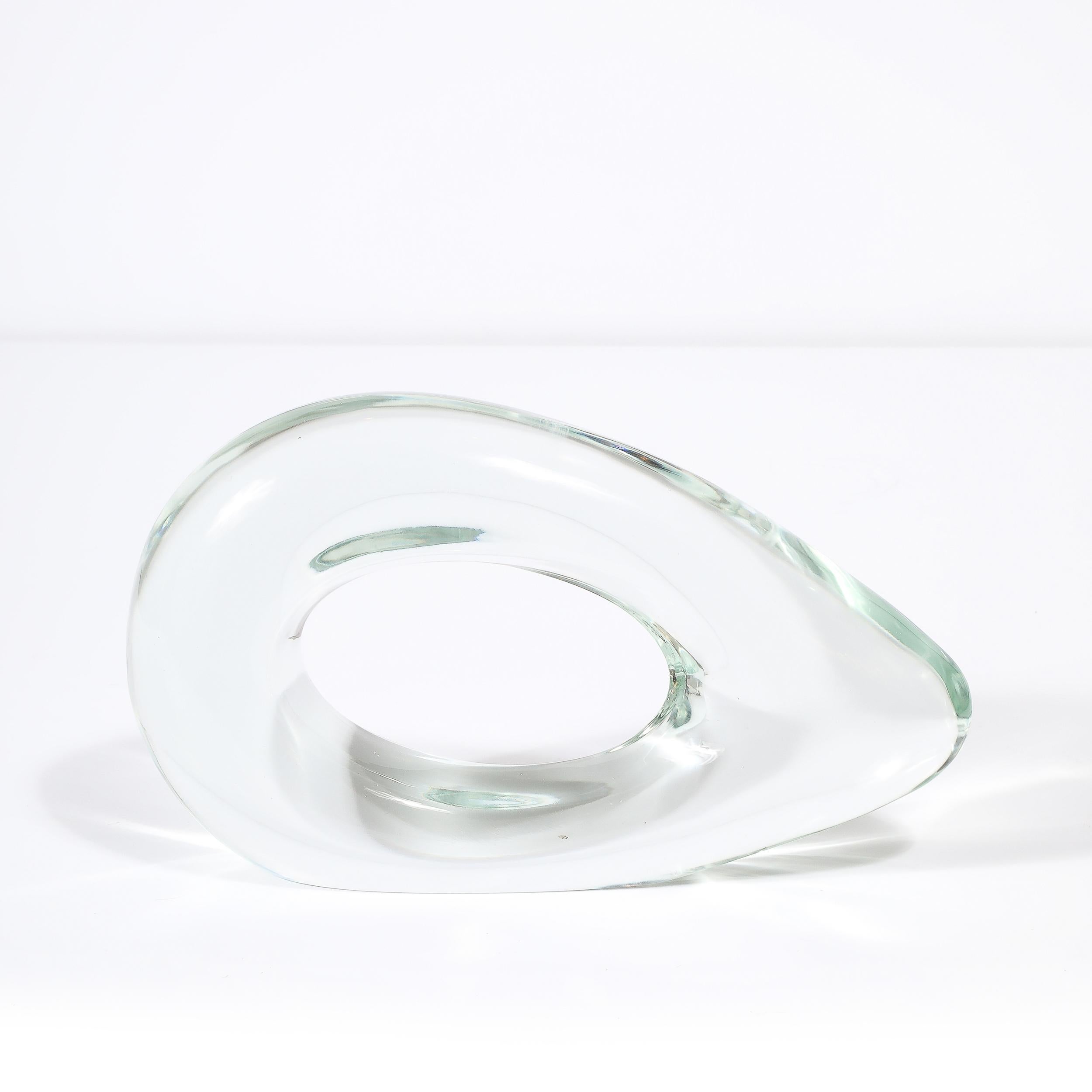 This minimal yet effortlessly stunning Mid-Century Modernist Organic Hand-Blown Transparent Murano Art Glass Sculpture is signed Salviati and originates from Italy, Circa 1960. Features an asymmetrical rounded form in stunning hand-blown murano
