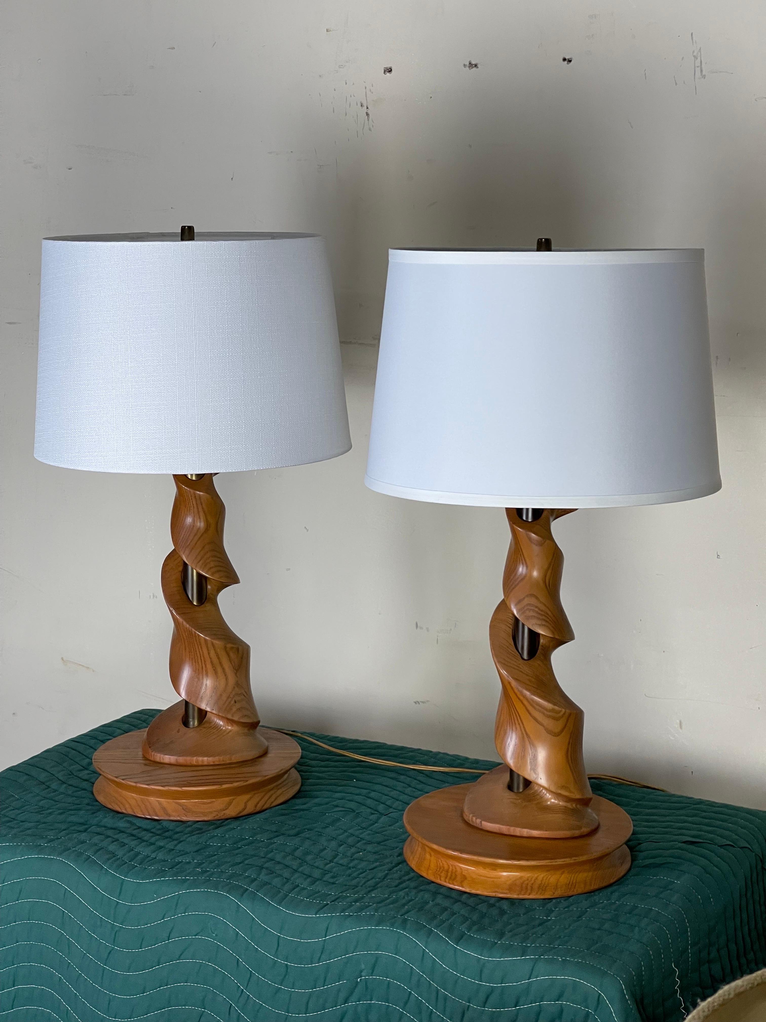 Incredible pair of table lamps by Light House Lamp Company - 1950’s. Original condition. Great patina and age appropriate wear. Slight separation where wood pieces were joined. Structurally sound. Please see pictures. 
Shades not included.