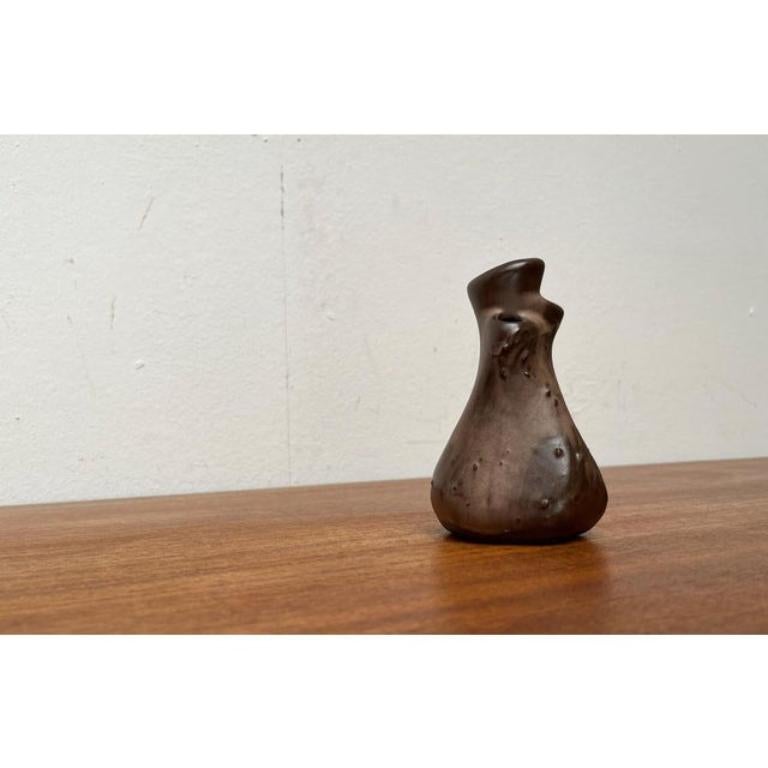 Vaso Studio Pottery di Montanus & Remy, Germania, 1960, in ottime condizioni. Progettato tra il 1960 e il 1969 Questo pezzo ha un marchio di attribuzione.

Informazioni aggiuntive:
Materiali: Ceramica
Colore: marrone
Stili: Medioevo Moderno
Paese di