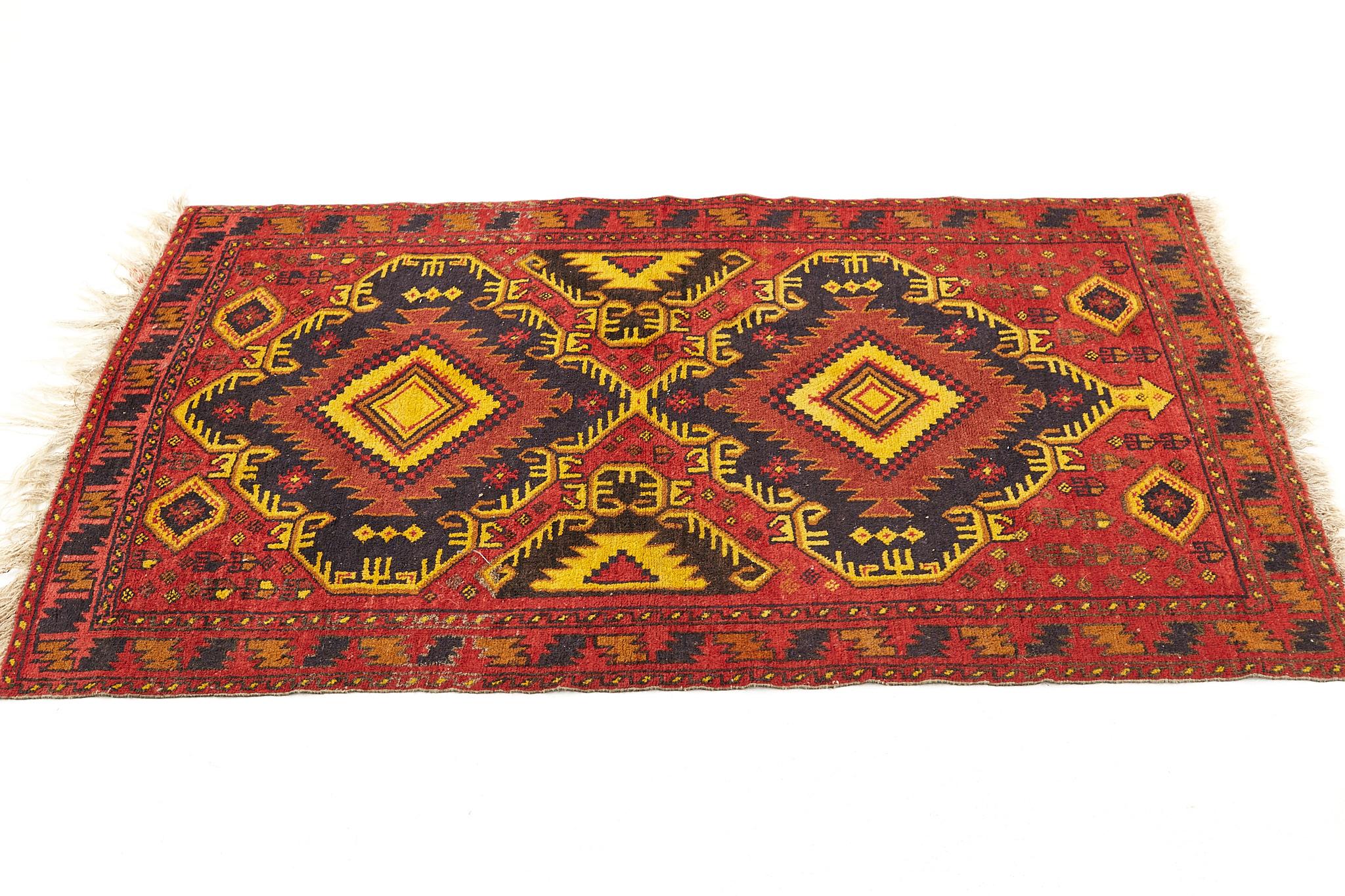 Mid century oriental red and gold rug

This rug is in great vintage condition

This rug measures: 59 wide x 34 inches deep

We take our photos in a controlled lighting studio to show as much detail as possible. We do not photoshop out