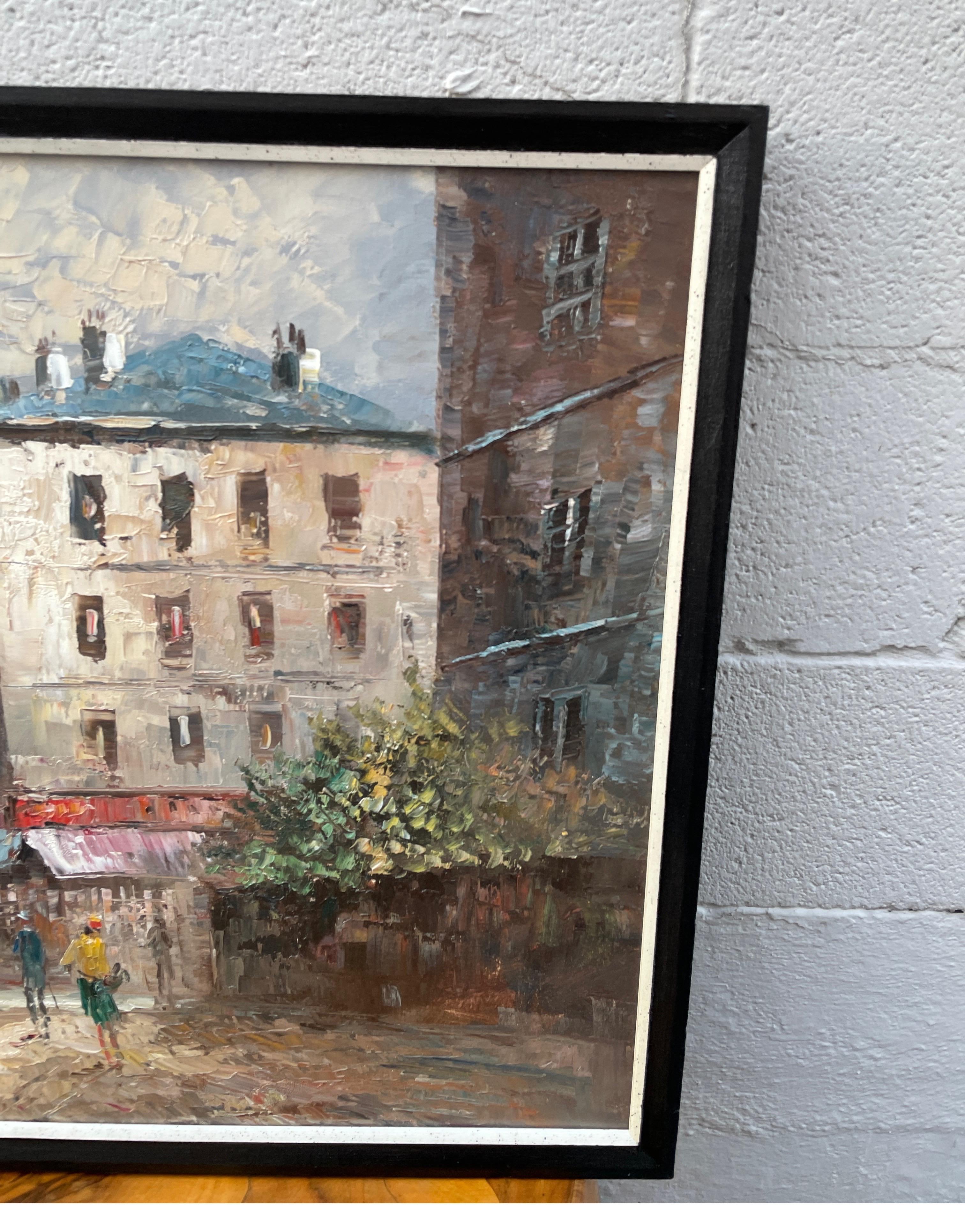 Mid century original French oil painting of a street scene in Paris.