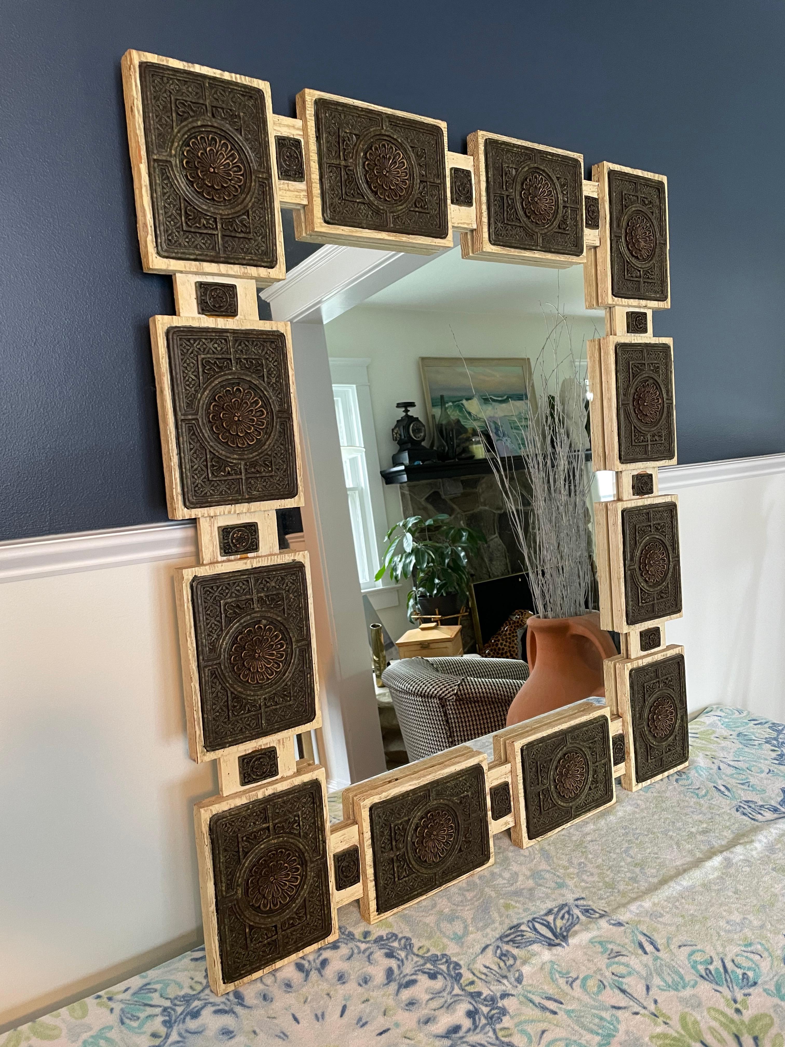Zarebski Mexican Mirror having bleached oak with resin applique. Made in the 1960s. Great detail in carved or molded medallions which jump off from white frame.