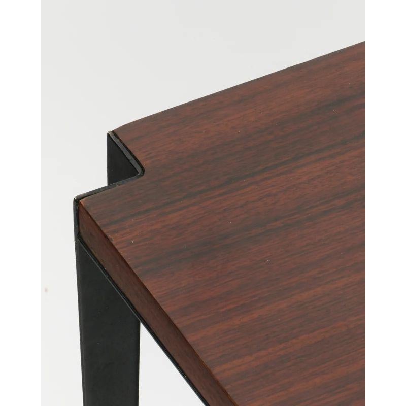 Mid-century design coffee table by Osvaldo Borsani, for Techno, circa 1950s. 

Veneered wood and enamelled metal. 

Dimension: H40 x W120 x D60 cm.
