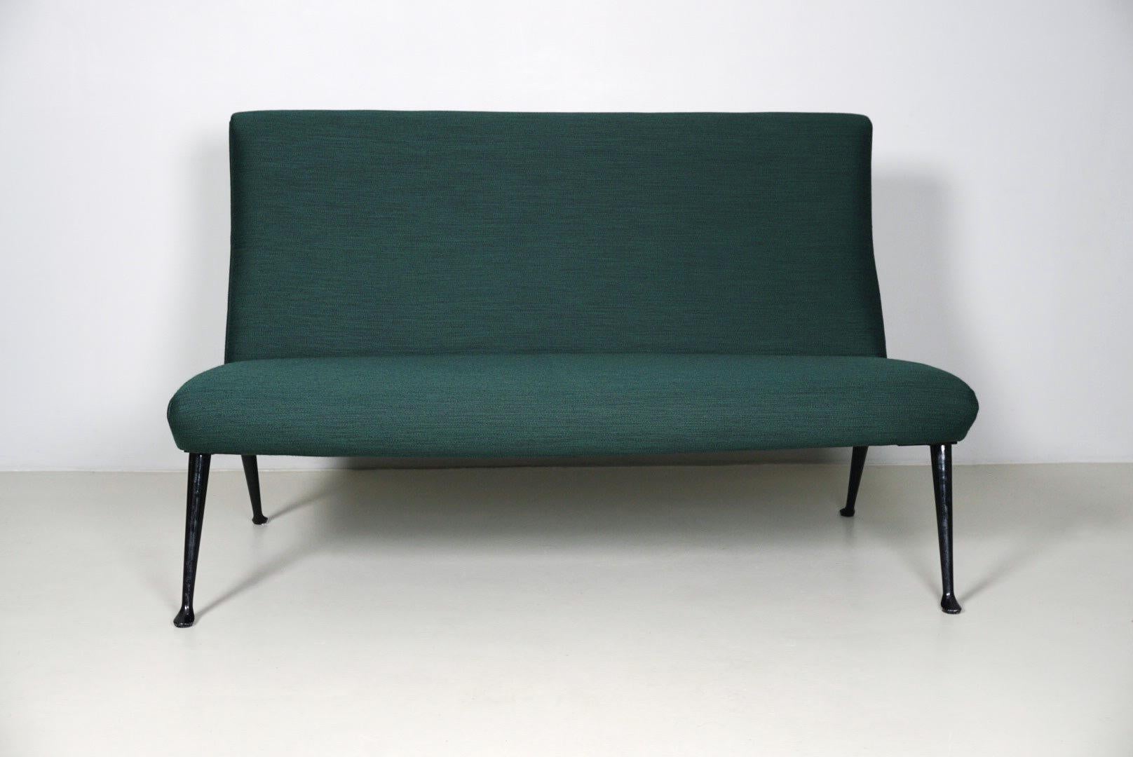 Mid-Century Modern sofa by Osvaldo Borsani with wood construction and a brass frame lacquered in black. The upholstery and the cover are renewed.


Dimensions / L. 140cm D. 83cm H. 89cm SH. 45cm
Design / Osvaldo Borsani 1954
Manufacturer / Tecno