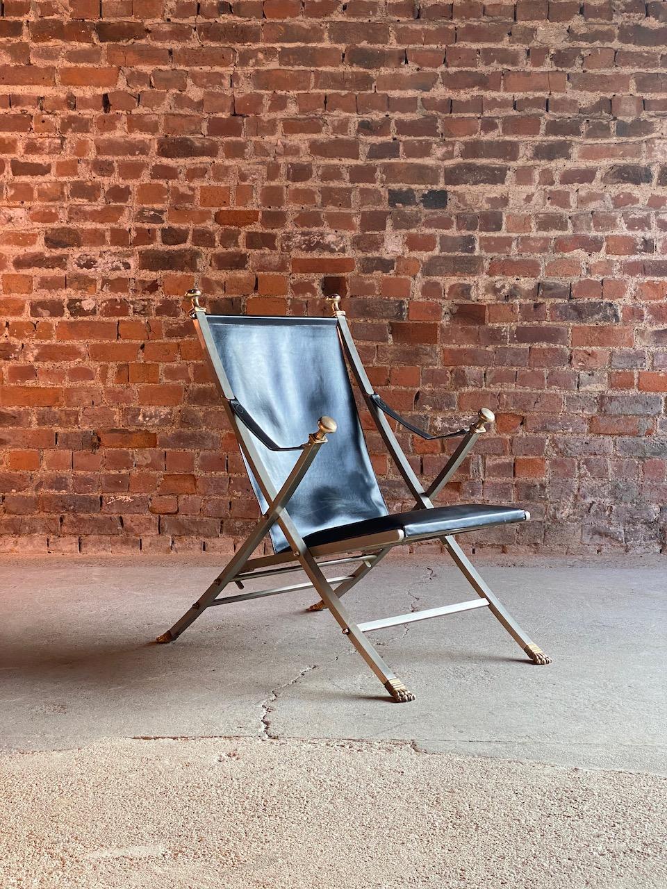Midcentury Otto Parzinger Campaign chair by Maison Jansen, Paris, 1960

French midcentury Otto Parzinger for Maison Jansen campaign chair, Paris circa 1960, the folding neoclassical brushed solid steel frame with black leather armrests, seat and