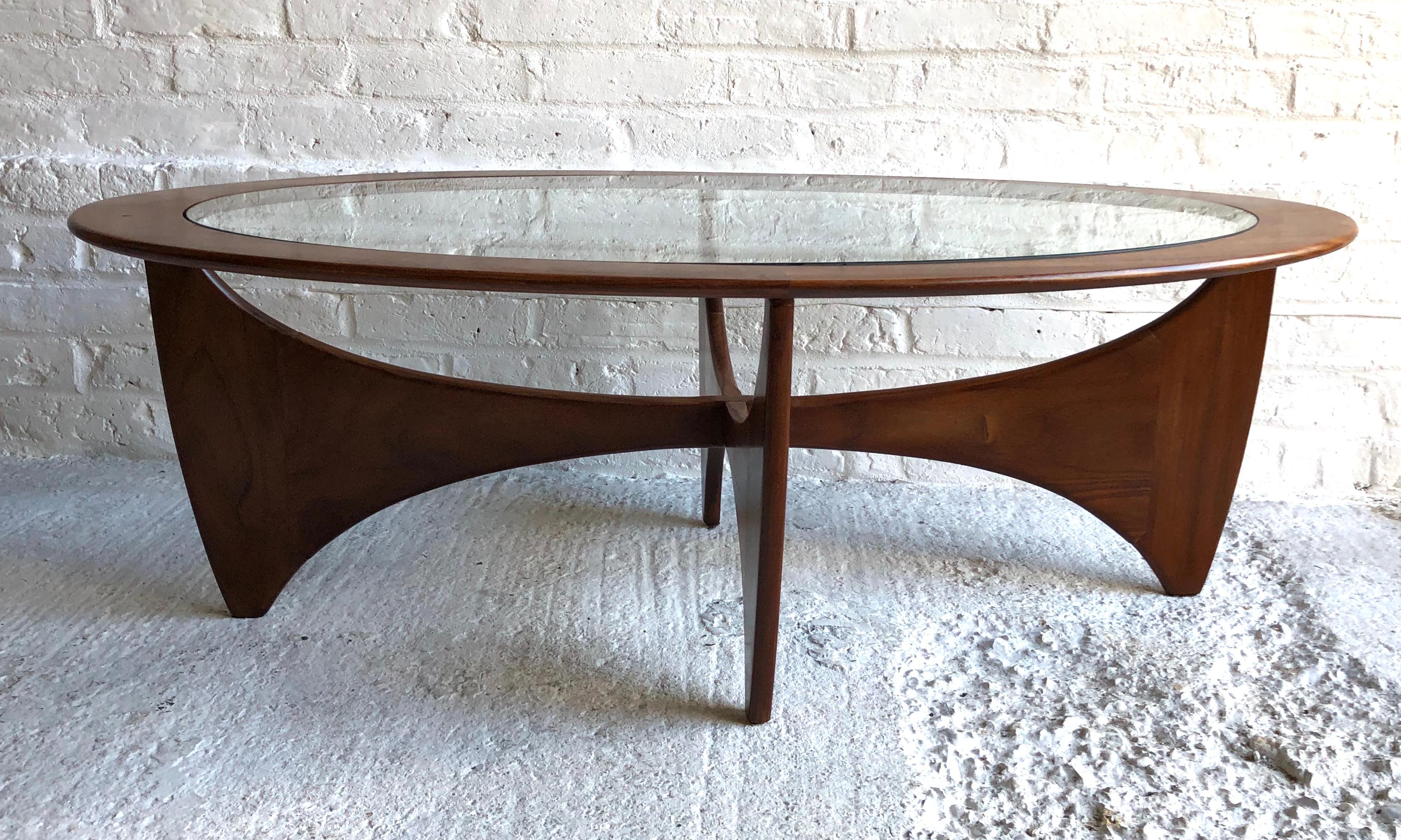 Midcentury oval Astro teak coffee table with glass top by G-Plan, 1960s
A beautiful sculptural coffee table designed by Victor Wilkins and manufactured by G Plan during the 1960s in England.
In great condition, table has recently been restored and