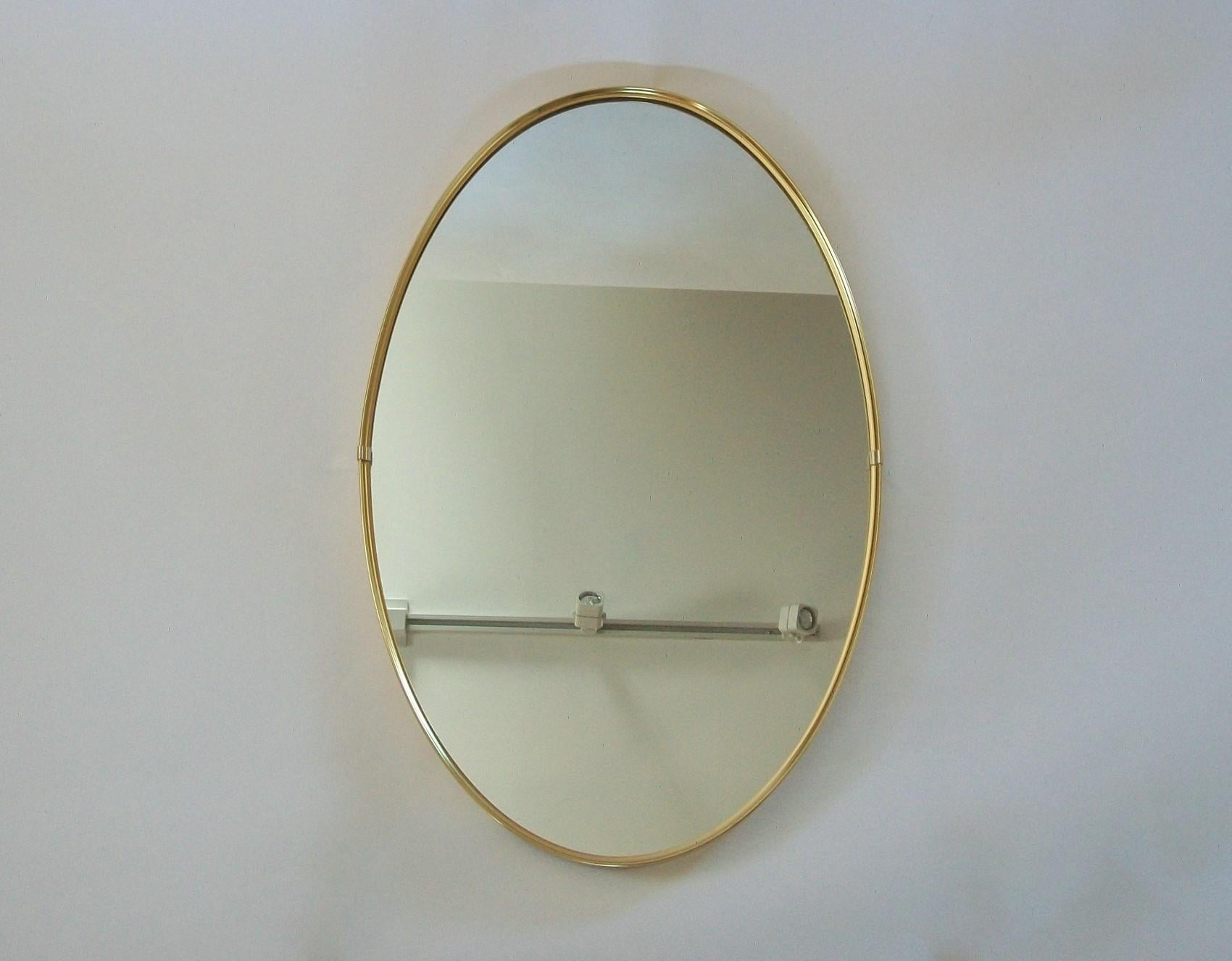 Hand-Crafted Midcentury Oval Brass Framed Mirror, Italy, circa 1970s