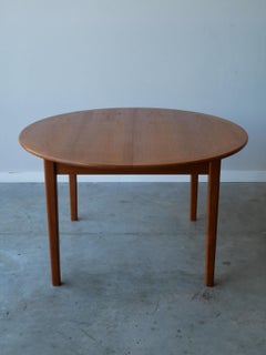 Mid-Century Oval Expanding Dining Table