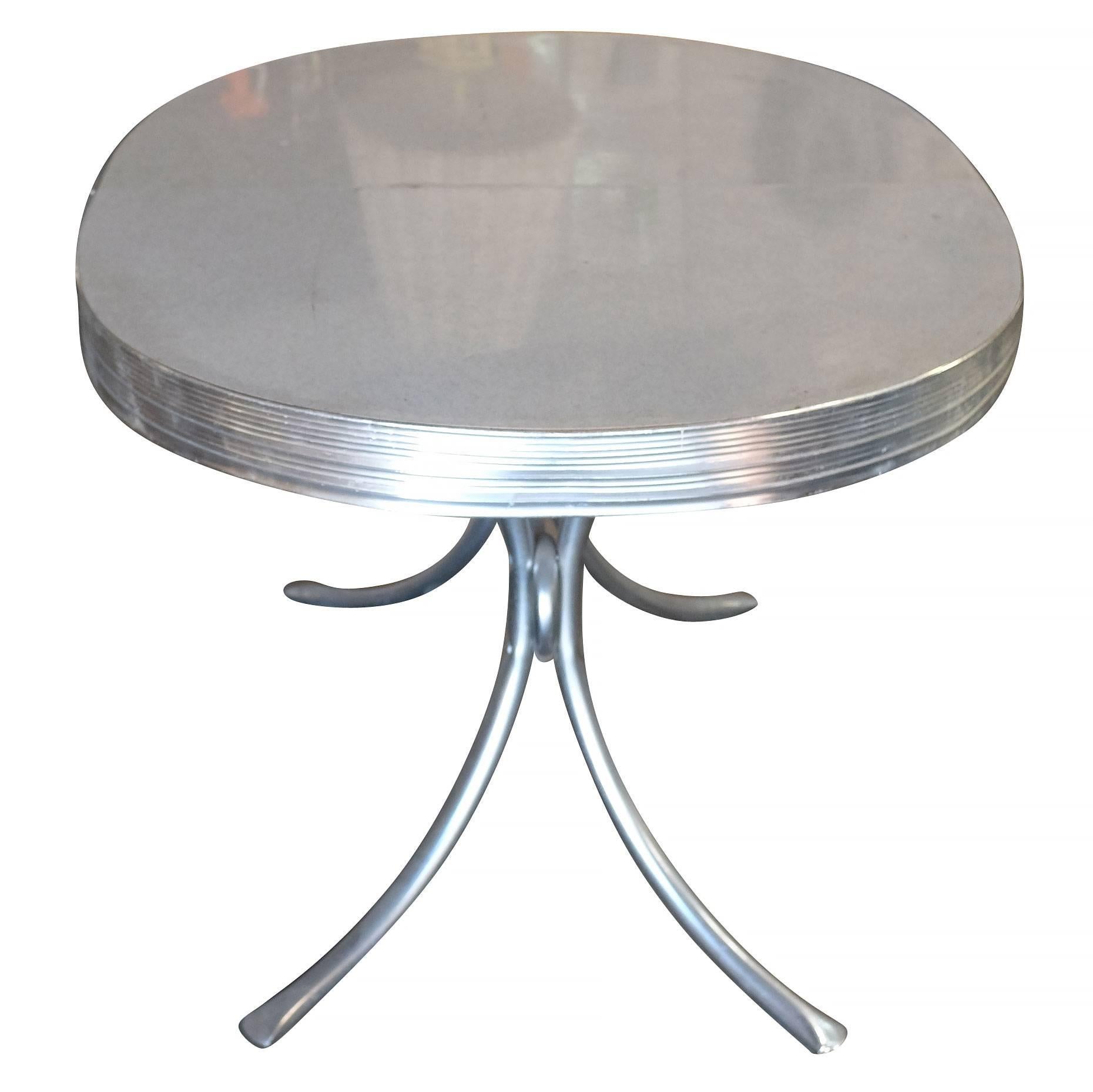 Midcentury white oval Formica kitchen table with chrome round tubular Legs.