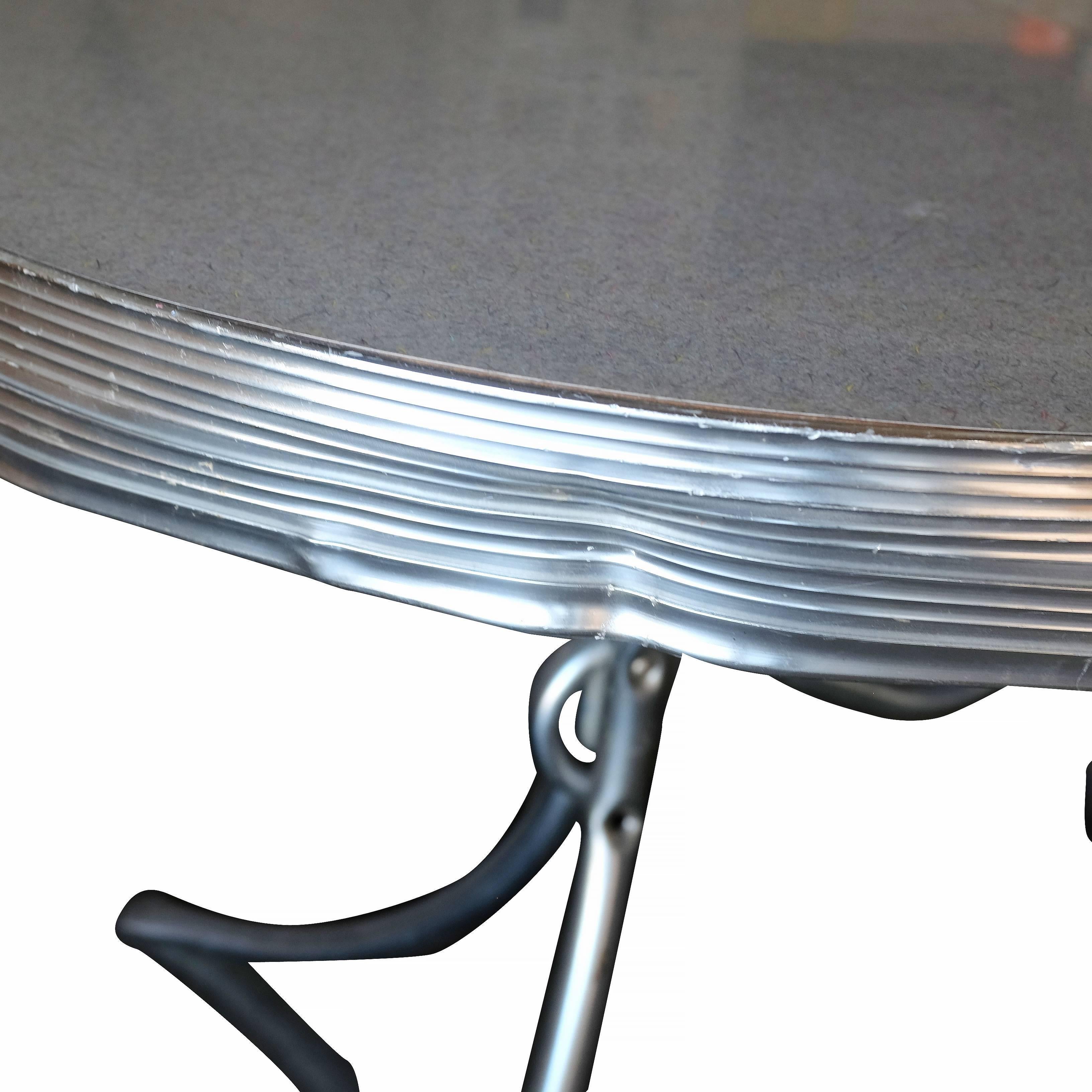 Midcentury Oval Formica Kitchen Dining Table with Chrome Legs In Fair Condition In Van Nuys, CA