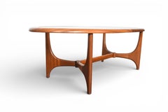 Mid Century Oval + Glass Coffee Table by Stonehill