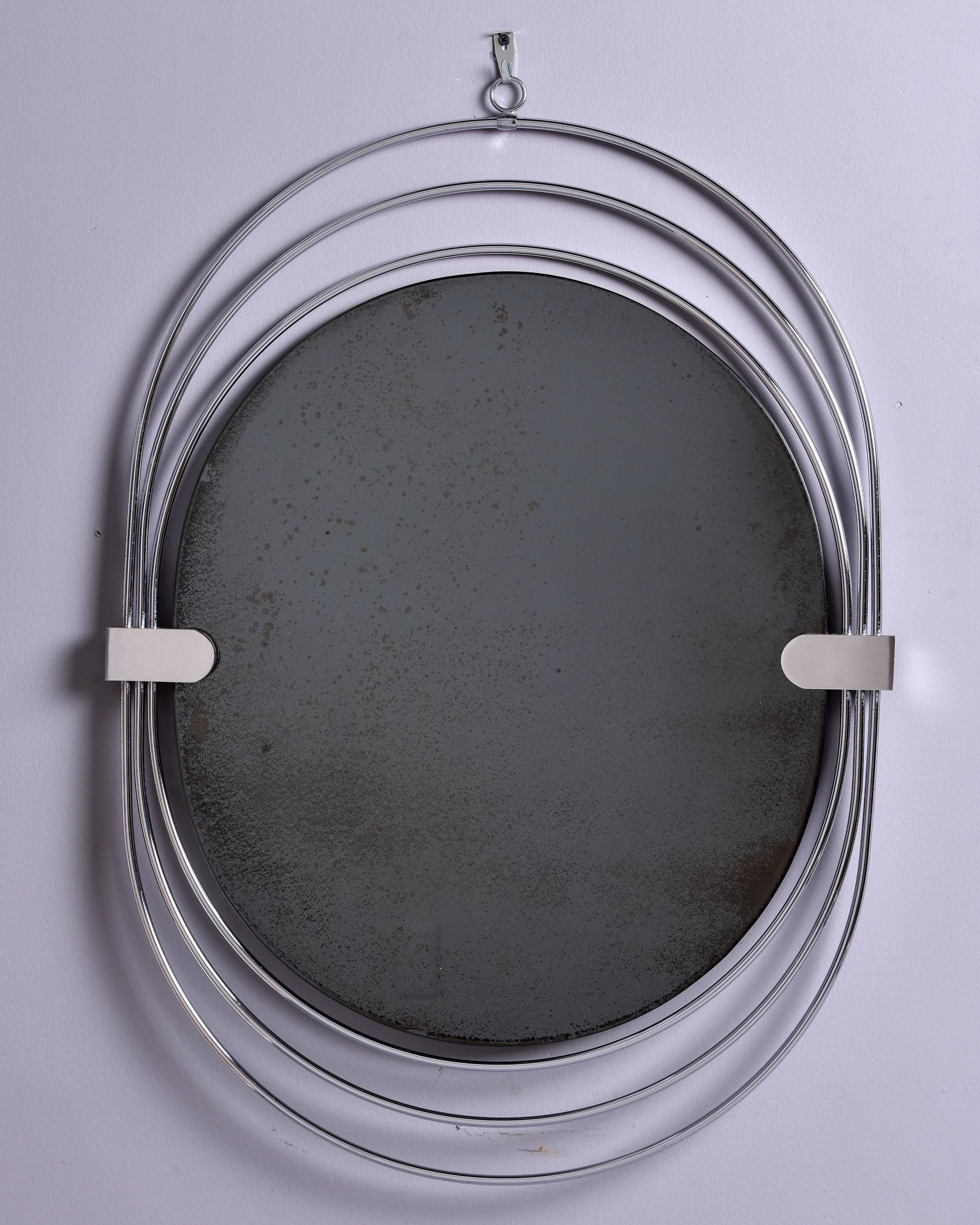 Mid Century Oval Mirror with Triple Chrome Ring Frame In Good Condition For Sale In Troy, MI