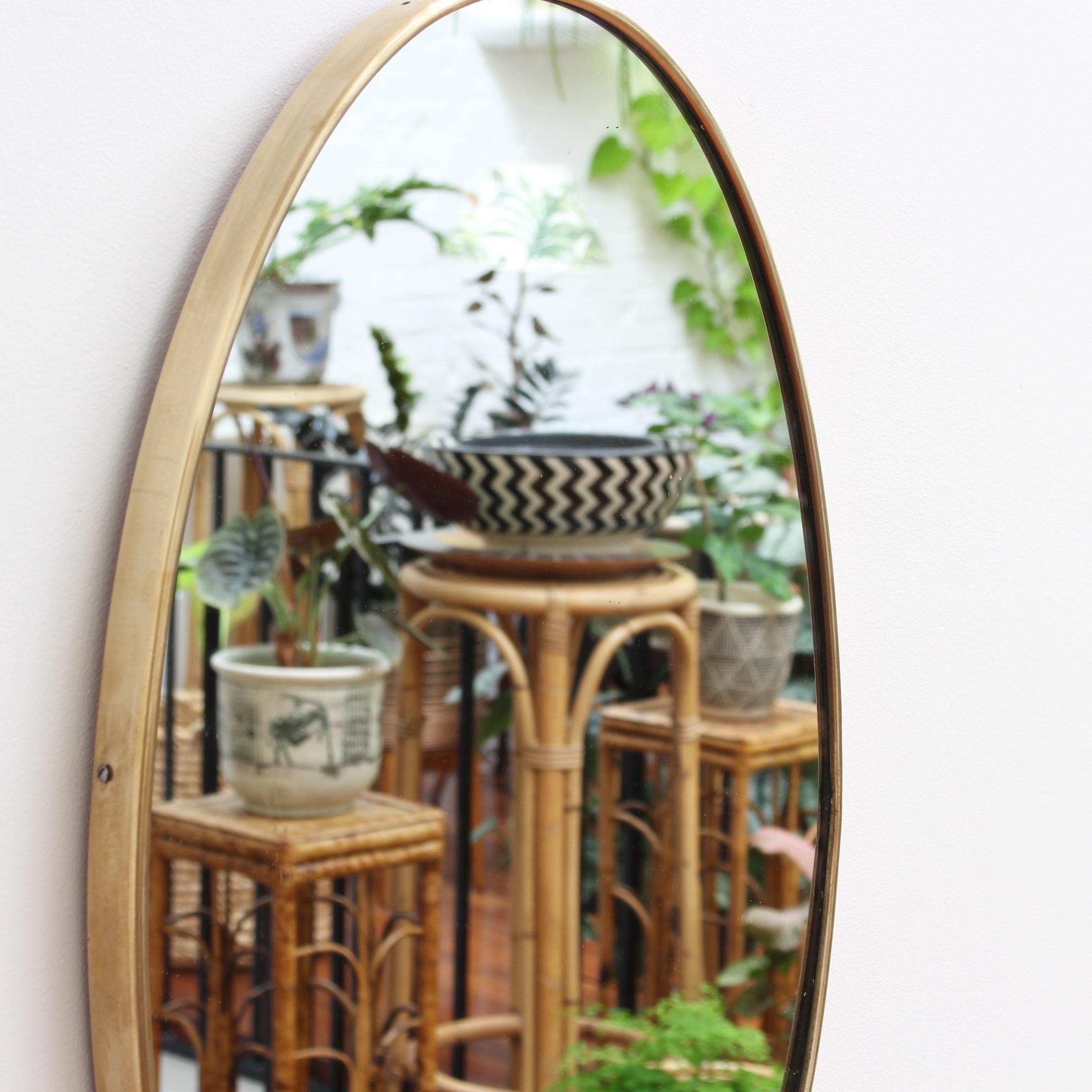 Mid-20th Century Midcentury Oval-Shaped Italian Wall Mirror with Brass Frame, 'circa 1950s'