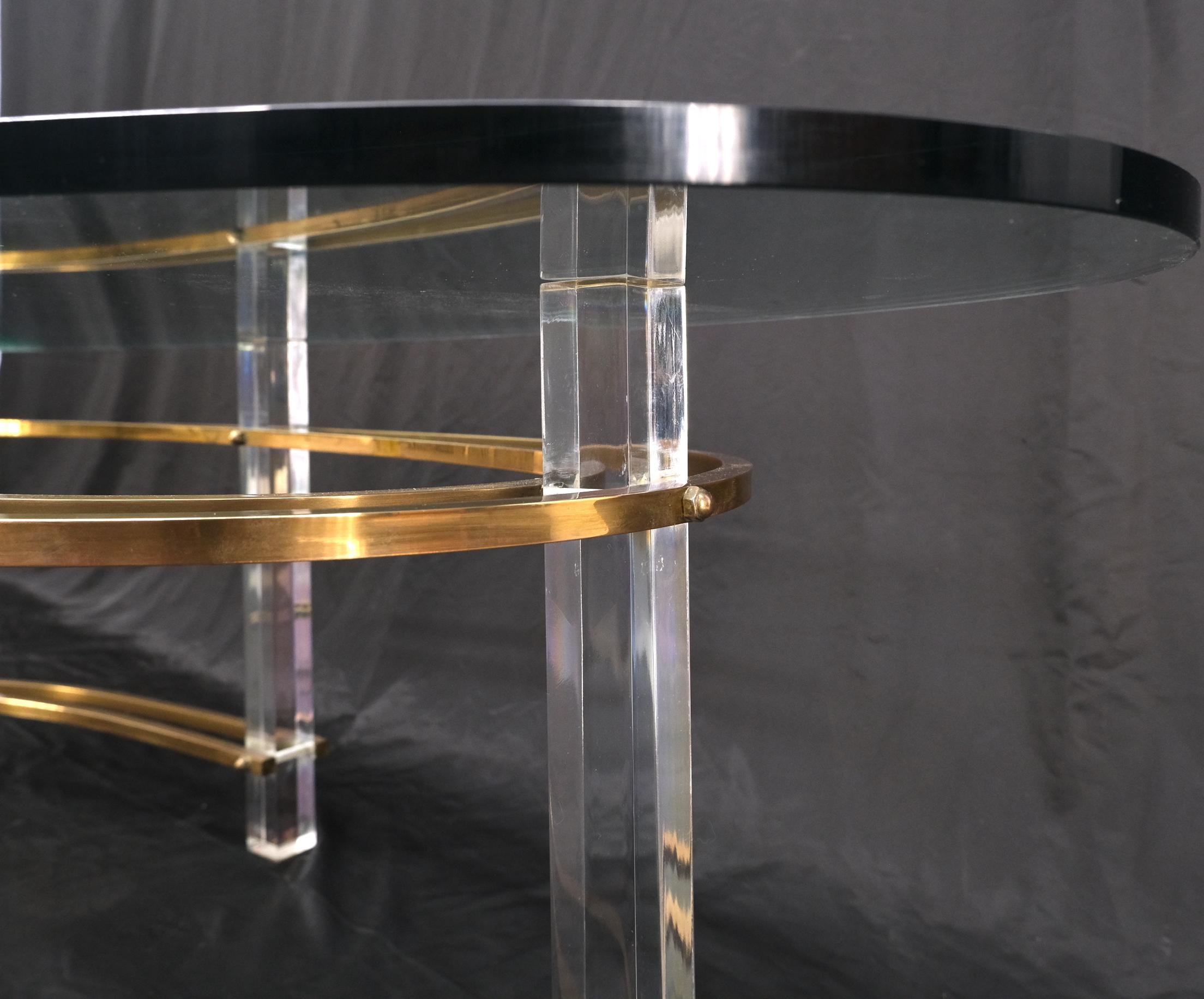 Mid-Century Oval Thick Glass Top Lucite Brass Base Coffee Table For Sale 2