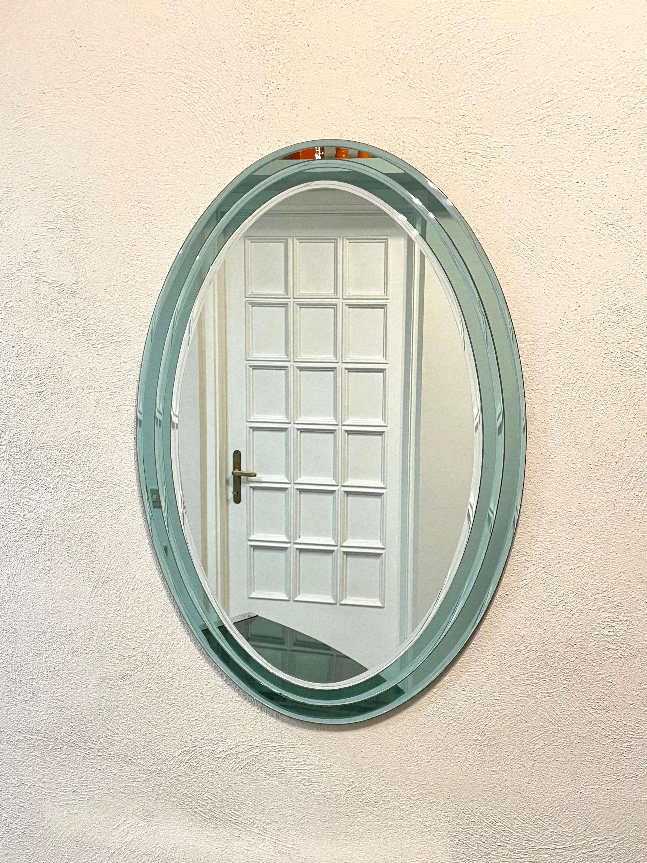 Italian Mid-Century Oval Wall Mirror Three Level Fontana Arte style, Italy 1970s For Sale