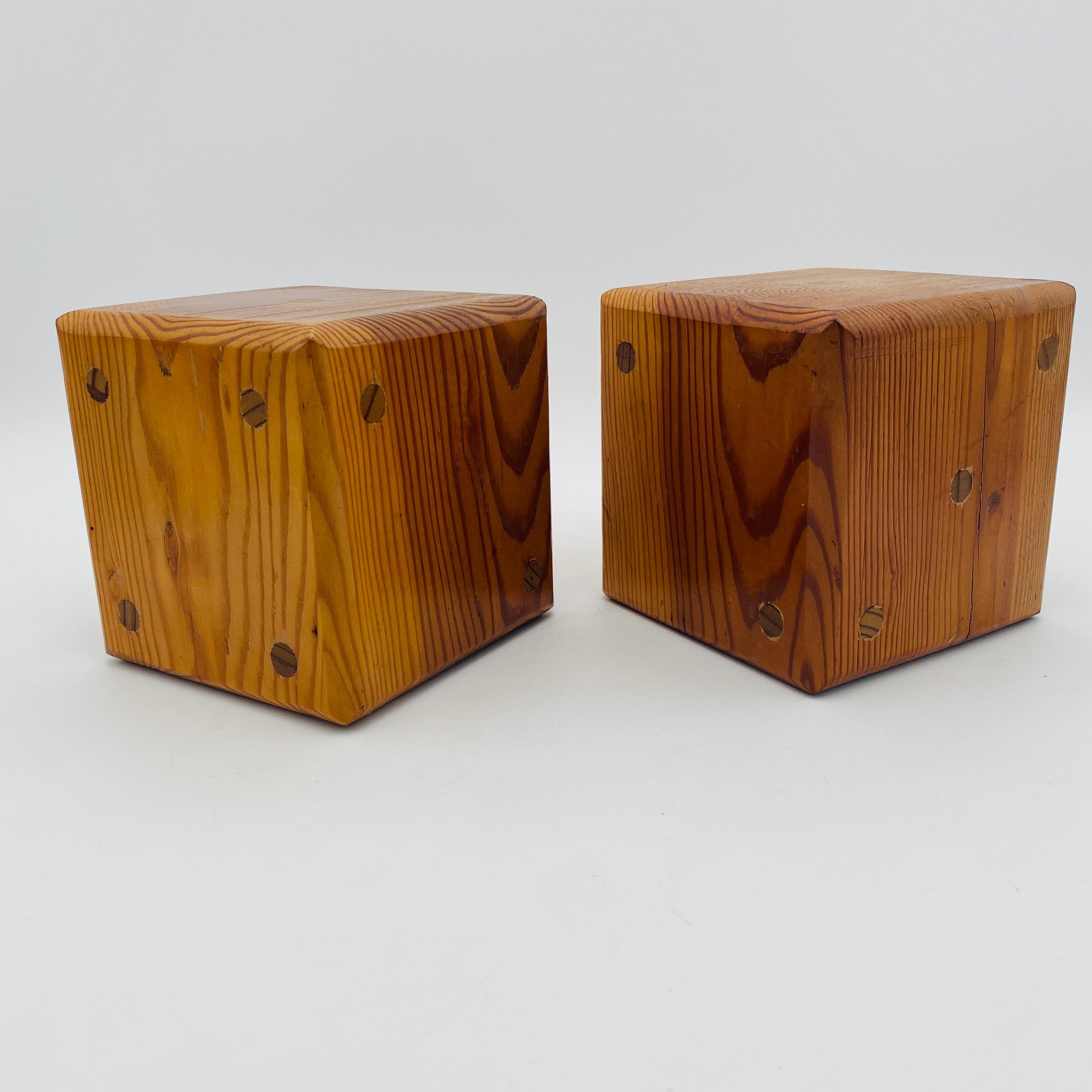 A pair of mid-century oversized dice hand-crafted with wood circa the 1970s. They measure 5.5