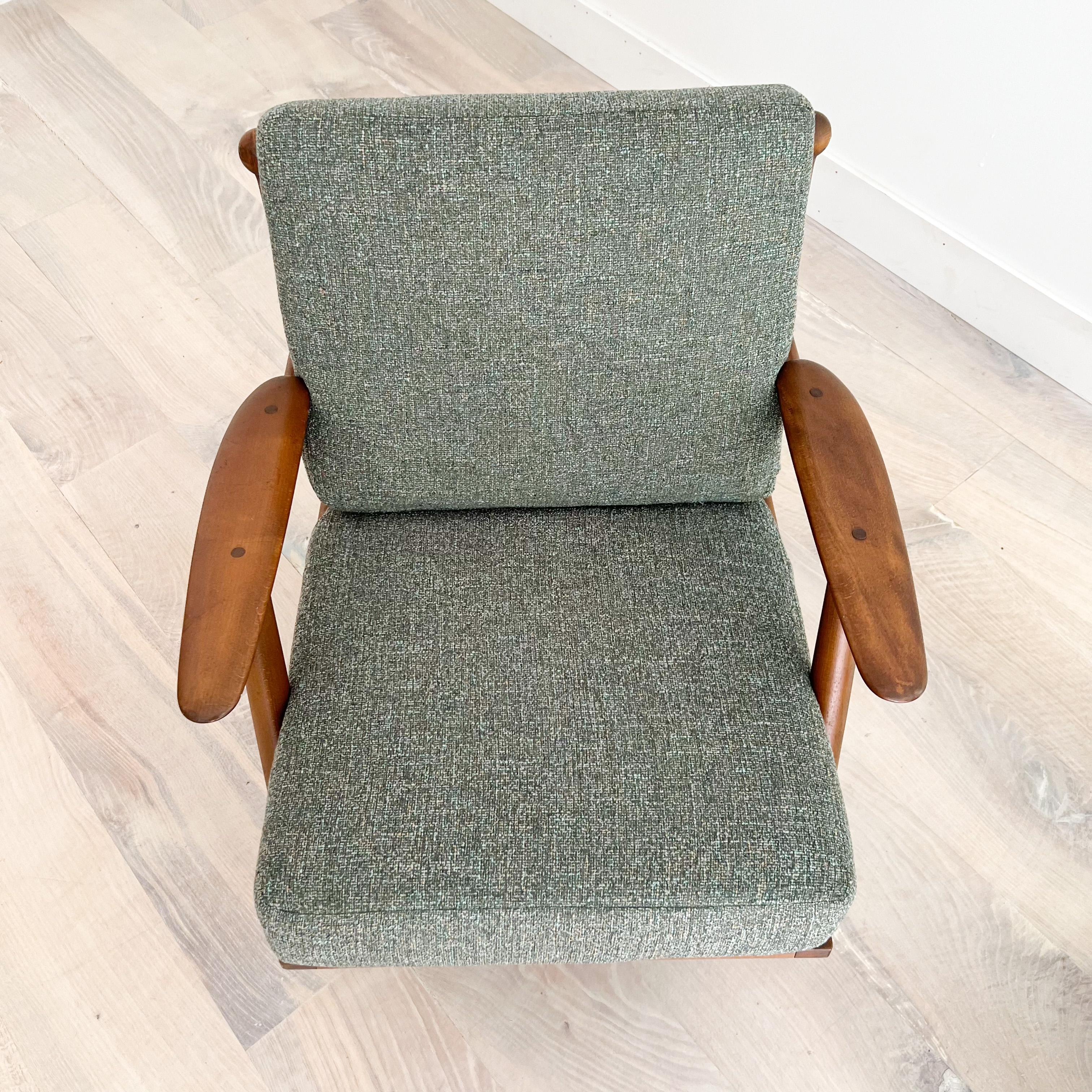Mid-Century Modern danish lounge chair - stamped P. Jeppesens (made in Denmark). New webbing, foam and green/grey tweed upholstery. Some light scuffing/scratching to the chair frame from age appropriate wear. Super unique chair!