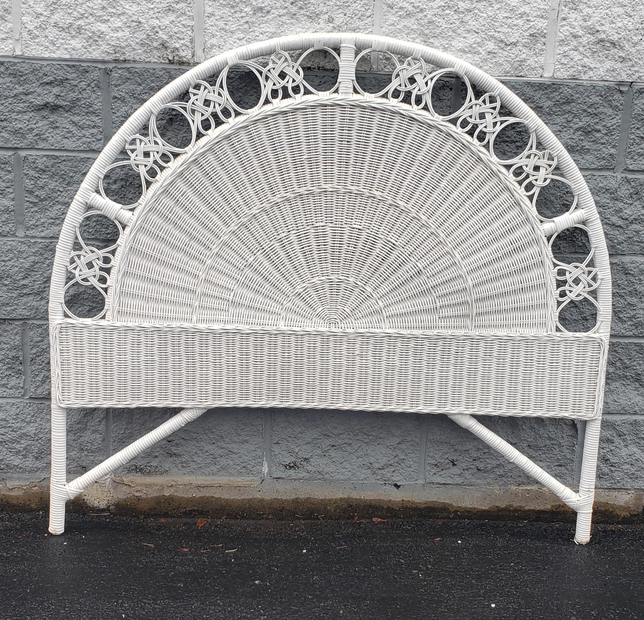 A midcentury painted white wicker full size headboard in very good vintage condition. Meaures 53.5