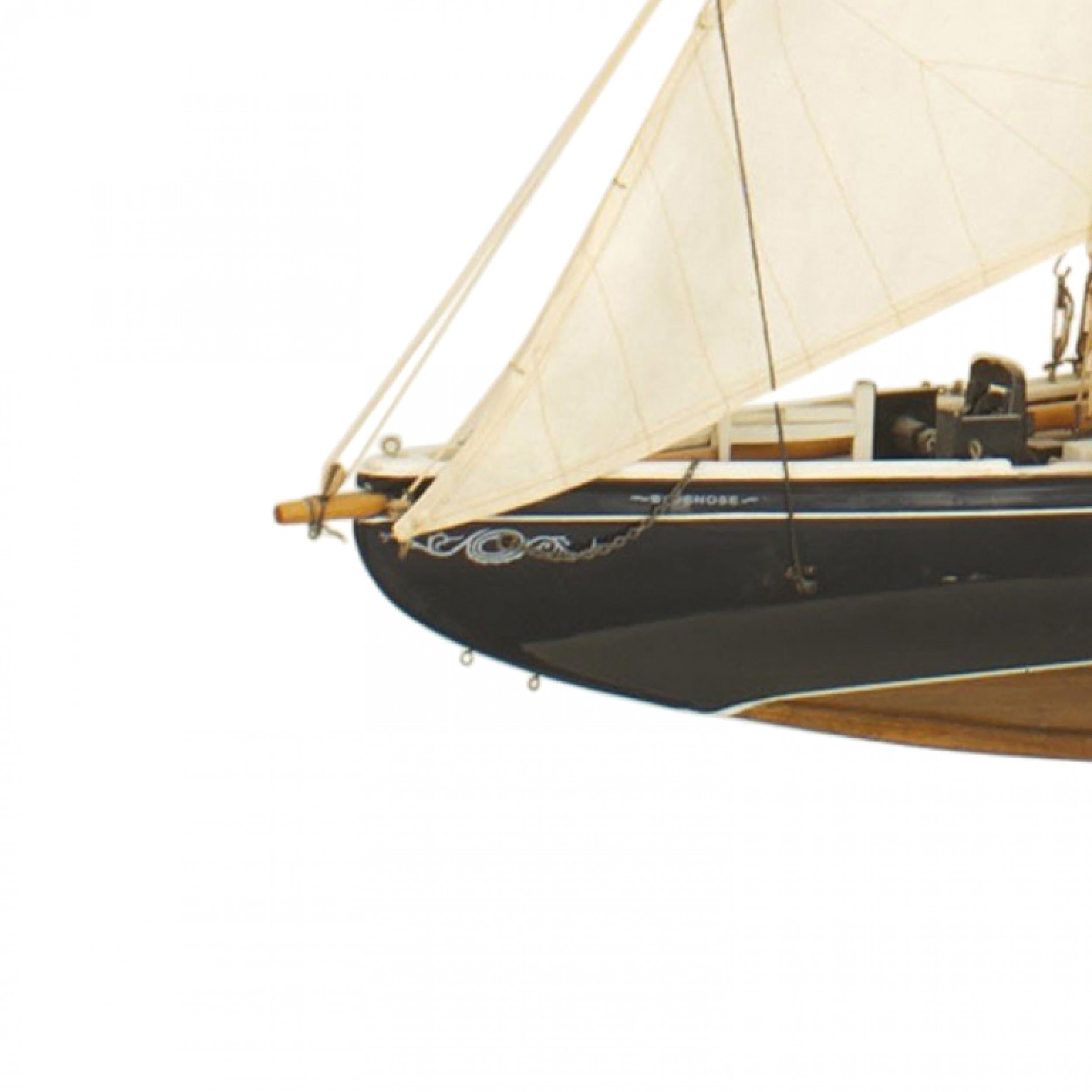 American Country style Mid-Century black painted with white trim model of a pond sailboat on stand 