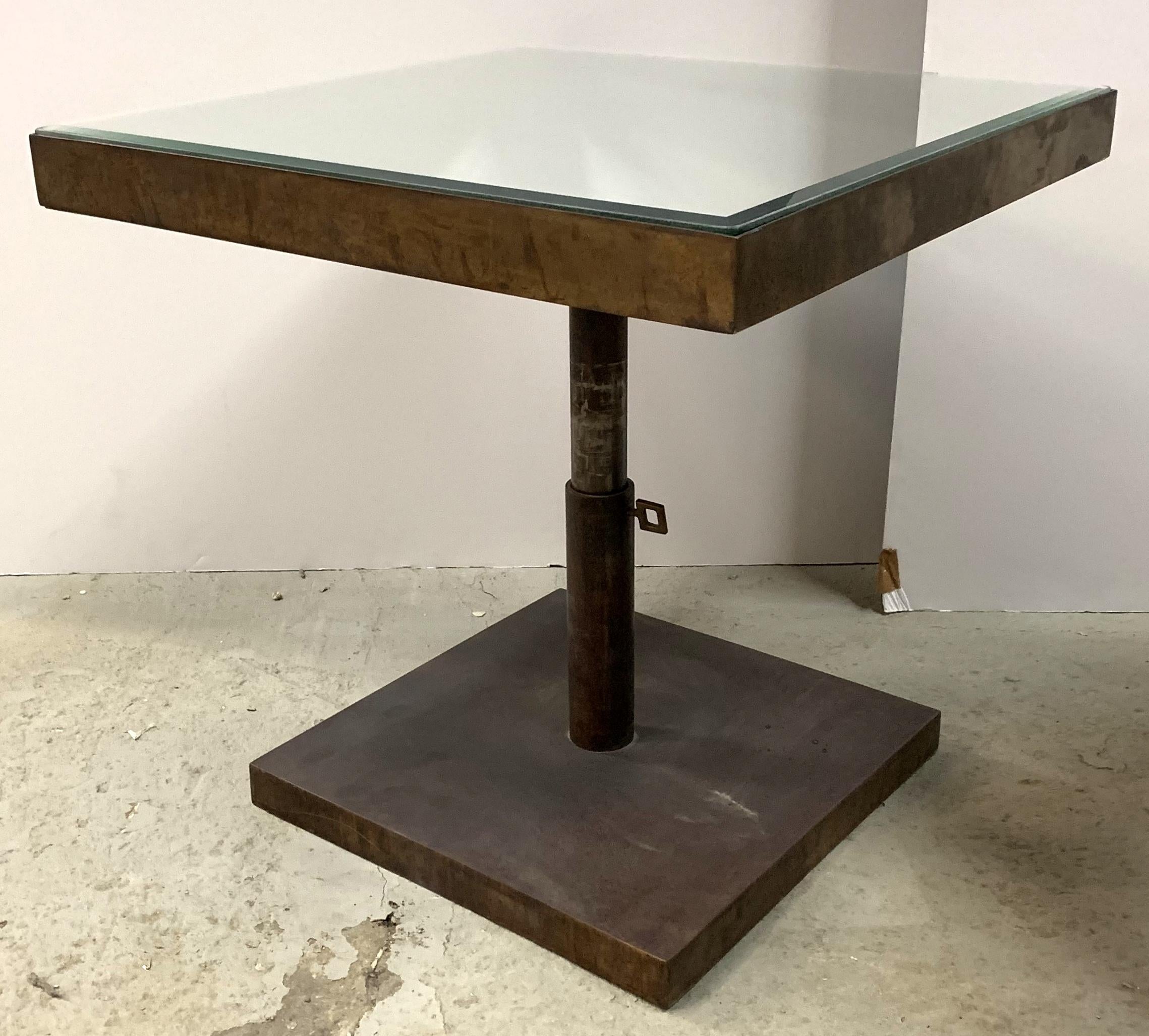 A wonderful pair of Mid-Century Modern Lorin Marsh antique bronze finish telescoping square side / end tables with beveled mirror top still being sold in the showroom. 

*Sold Separately 

The height is adjustable from 16