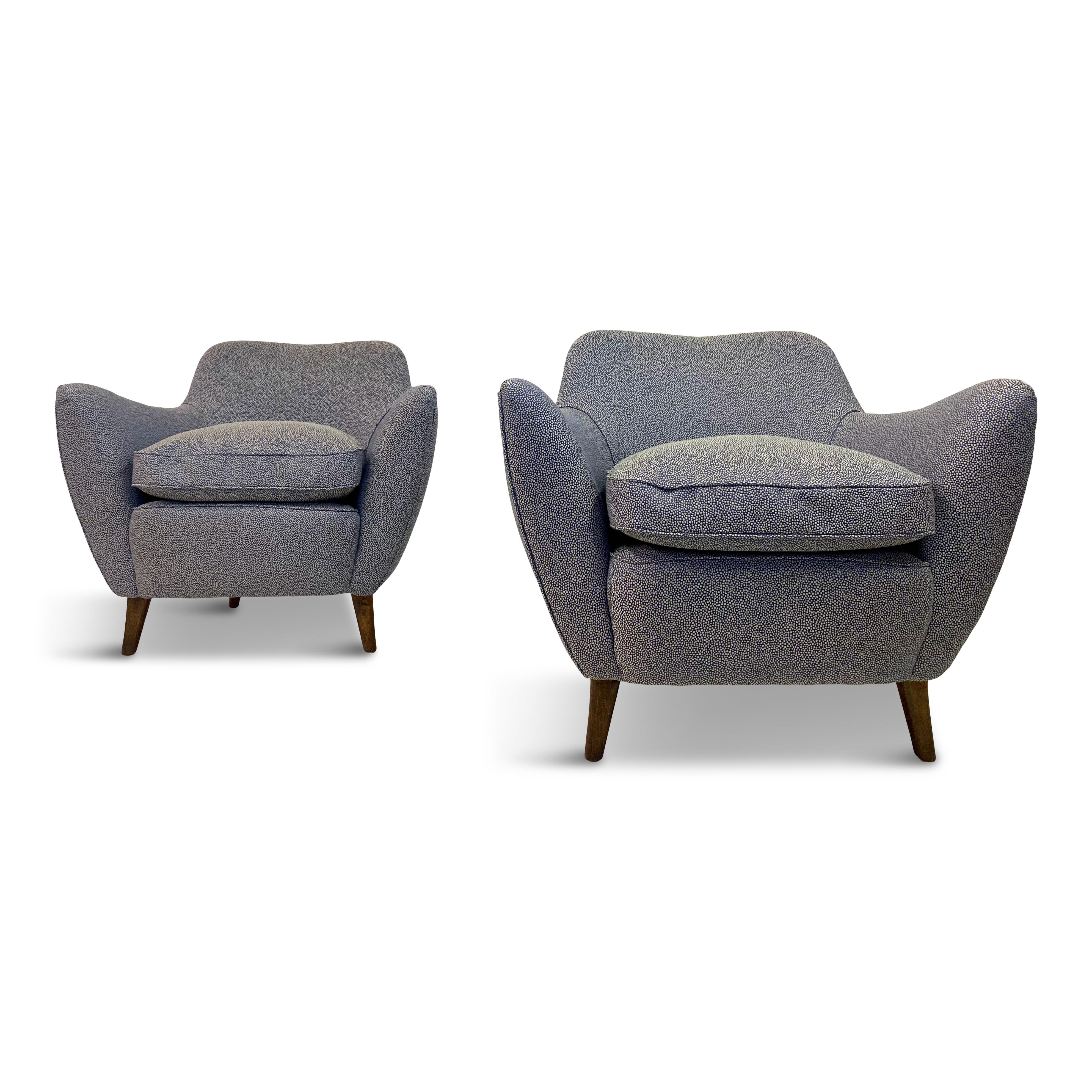 A pair of armchairs

In the style of Guglielmo Veronesi

Newly upholstered in Jim Thompson fabric

Italy, 1950s.