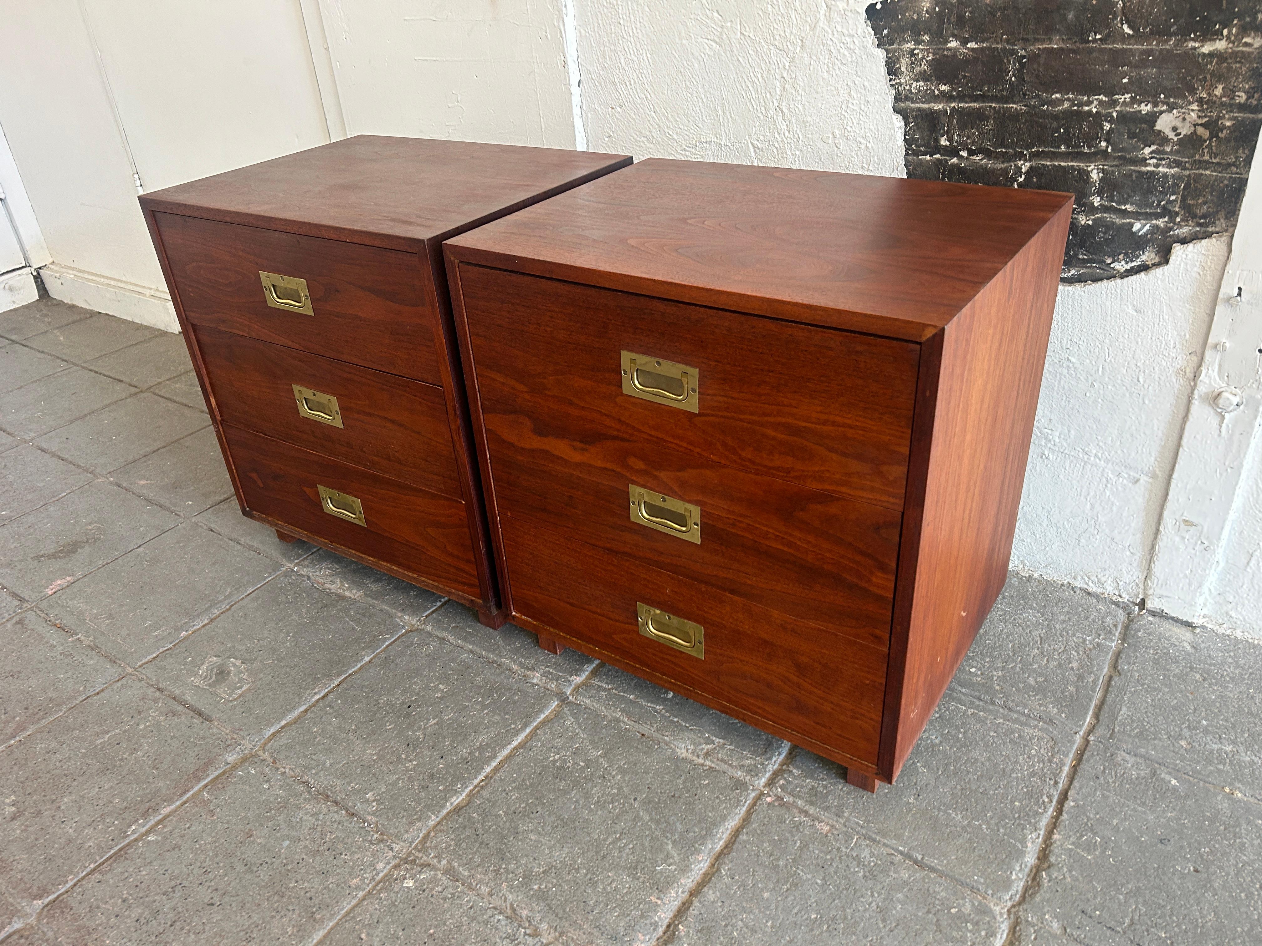 American Mid century pair of 3 drawer walnut brass campaign style nightstands For Sale