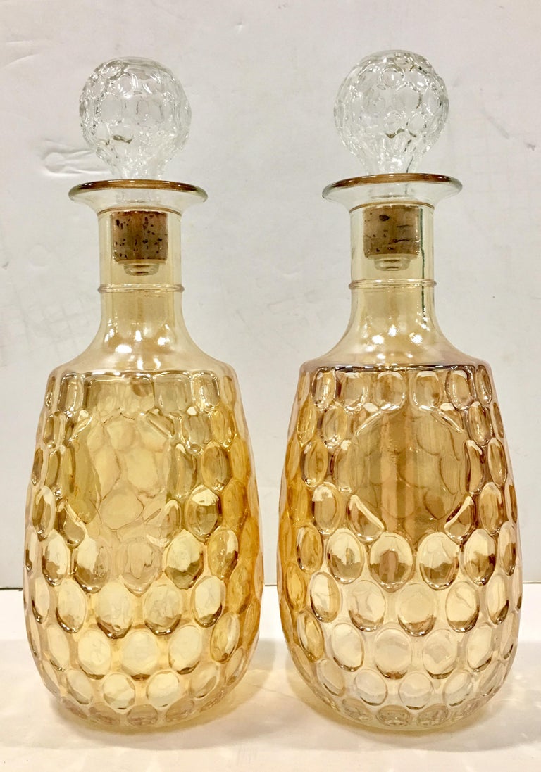 Mid-Century Pair Of American Blown Glass Iridescent Thumbprint Liquor Decanters at 1stdibs