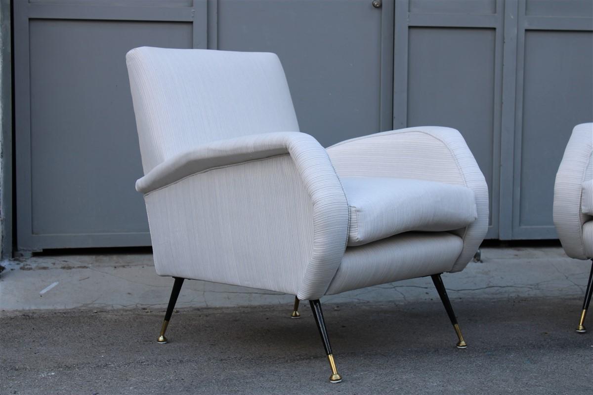 Mid-century pair of armchairs Italian design Gigi Radice ribbed fabric brass feet, 1950s.